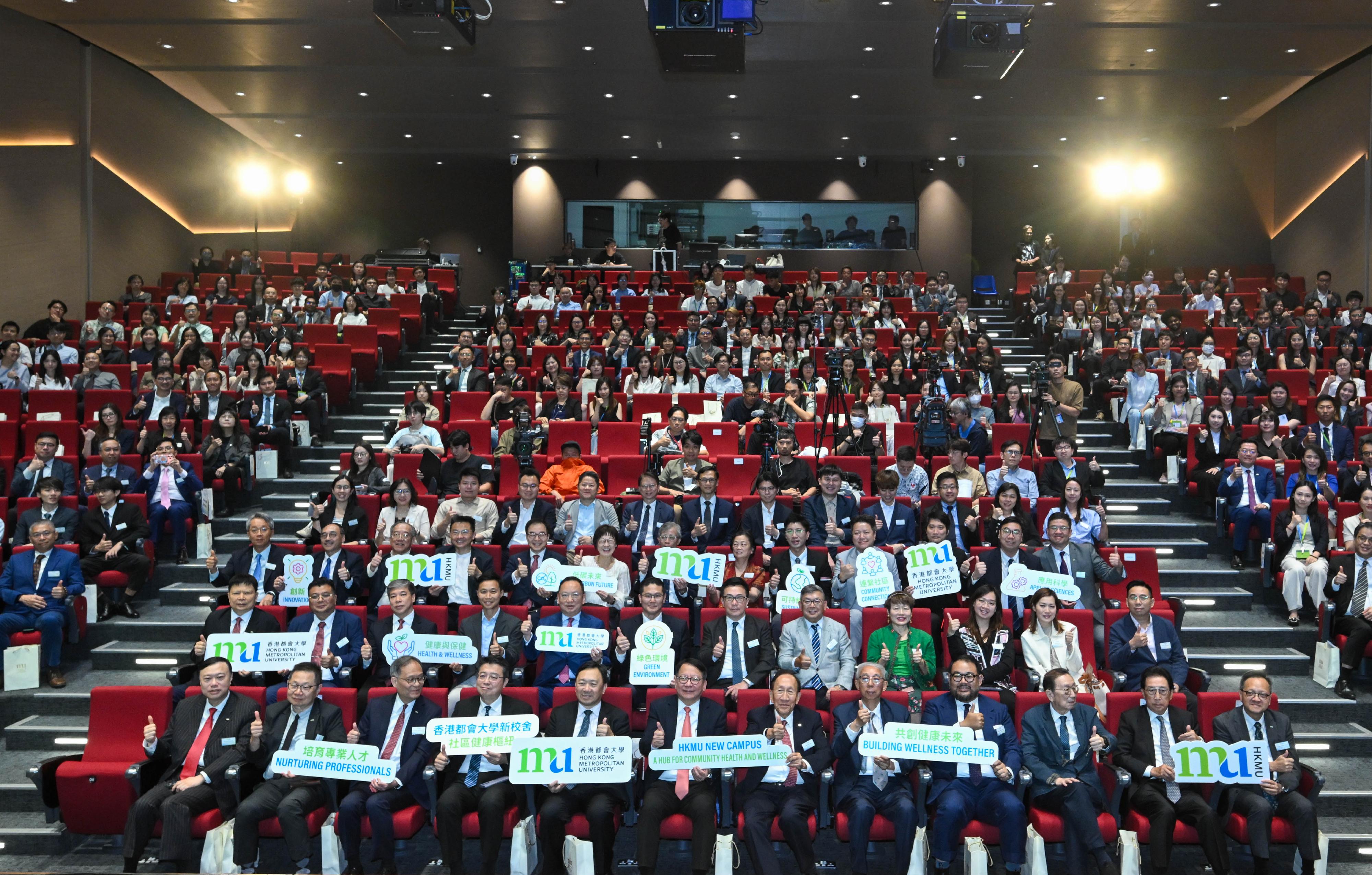 The Chief Secretary for Administration, Mr Chan Kwok-ki, attended the Groundbreaking Ceremony for the HKMU (Hong Kong Metropolitan University) New Campus - A Hub for Community Health and Wellness today (June 9). Photo shows Mr Chan (front row, sixth left); the Pro-Chancellor of the HKMU, Dr Eddy Fong (front row, seventh left); the Council Chairman of the HKMU, Dr Conrad Wong (front row, fifth left); the President of the HKMU, Professor Paul Lam (front row, third left), and other guests at the event.