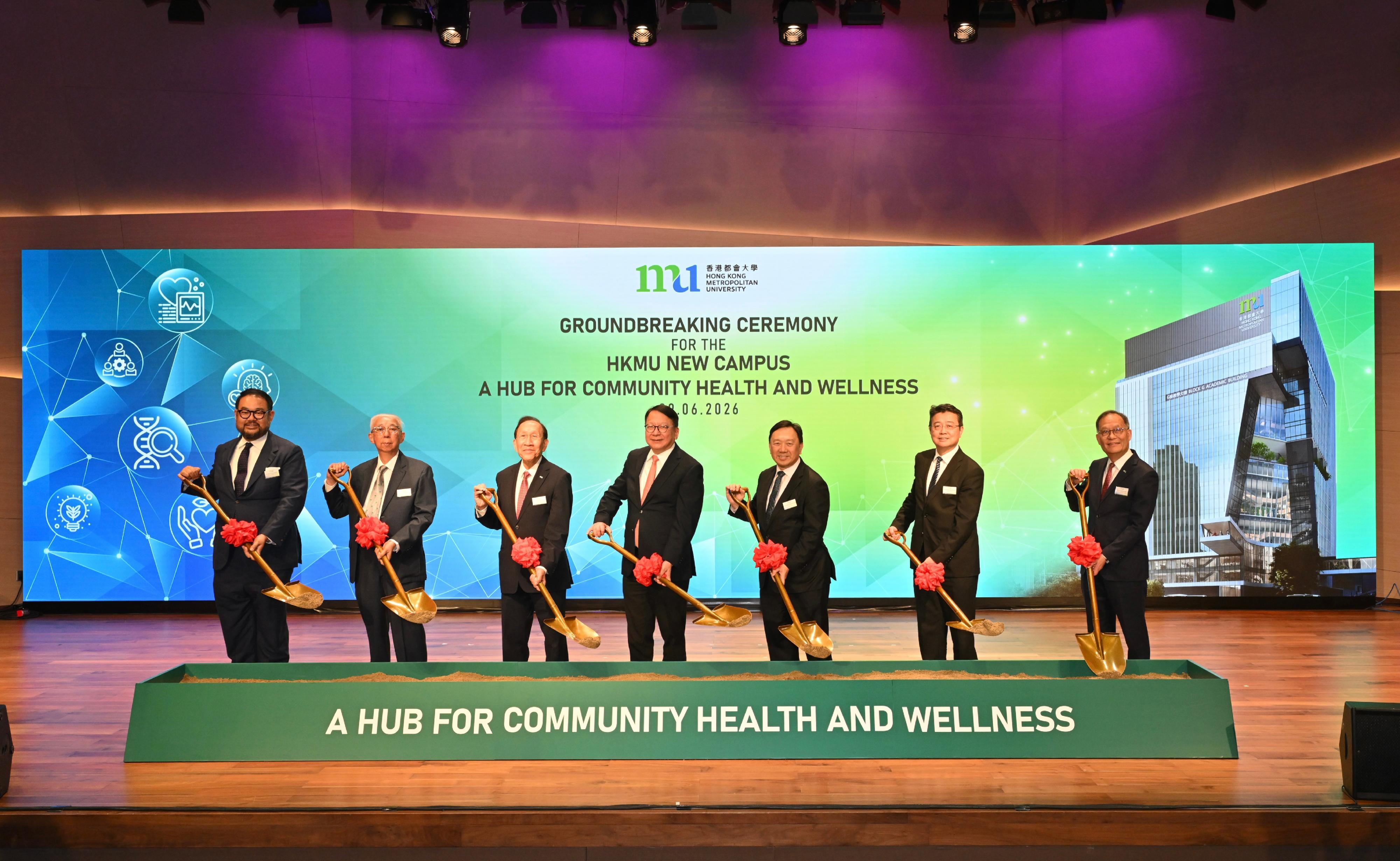 The Chief Secretary for Administration, Mr Chan Kwok-ki, attended the Groundbreaking Ceremony for the HKMU (Hong Kong Metropolitan University) New Campus - A Hub for Community Health and Wellness today (June 9). Photo shows Mr Chan (centre); the Pro-Chancellor of the HKMU, Dr Eddy Fong (third left); the Council Chairman of the HKMU, Dr Conrad Wong (third right); the President of the HKMU, Professor Paul Lam (first right), and other guests officiating at the ceremony.
