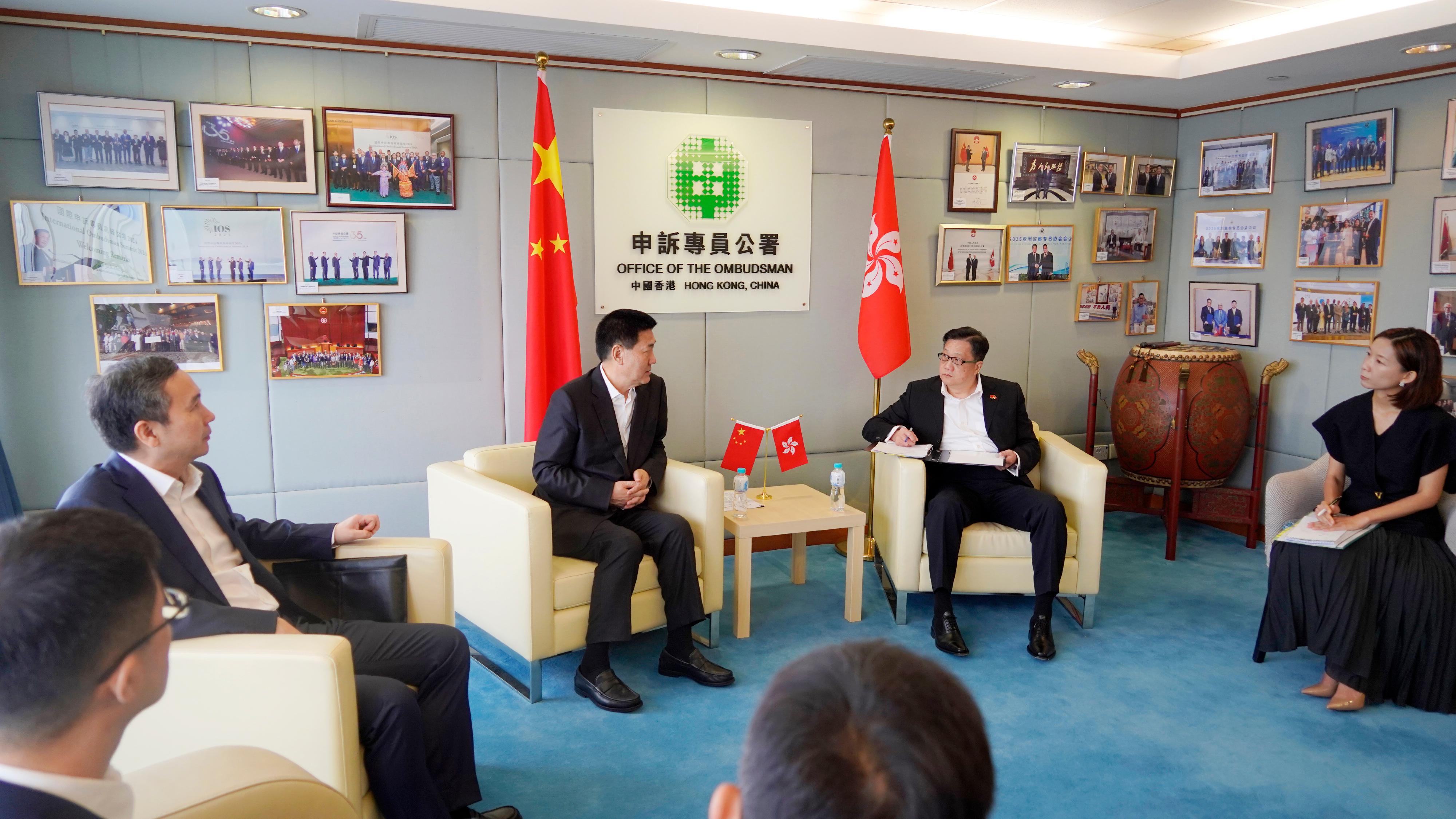 The Ombudsman, Mr Jack Chan (second right), today (June 9) met with the delegation from the National Commission of Supervision.