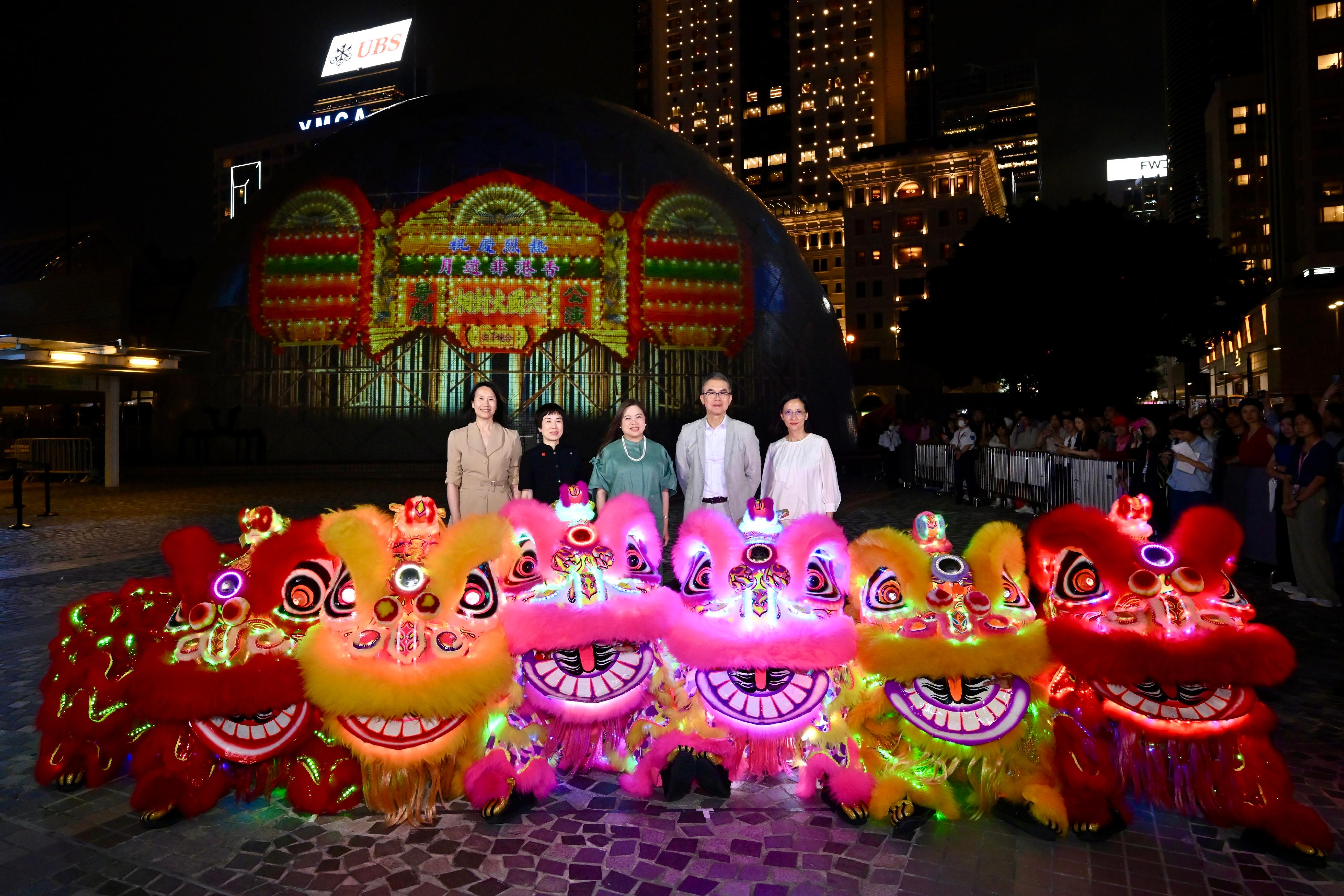 The Hong Kong Jockey Club Series: "Journey of the Horse: A Legacy of Arts and Culture" Light Show will feature a light projection onto the iconic dome façade of the Hong Kong Space Museum at night, from today (June 11) until June 24. Photo shows (from left) the Director of Leisure and Cultural Services, Ms Manda Chan; the Head of Charities (Culture & Sports Cluster; Community Engagement) of the Hong Kong Jockey Club, Ms Winnie Yip; the Secretary for Culture, Sports and Tourism, Miss Rosanna Law; the Chairperson of the Intangible Cultural Heritage (ICH) Advisory Committee, Professor Ricardo Mak; and the Head of the ICH Office, Ms Judith Ng, viewing the light show.