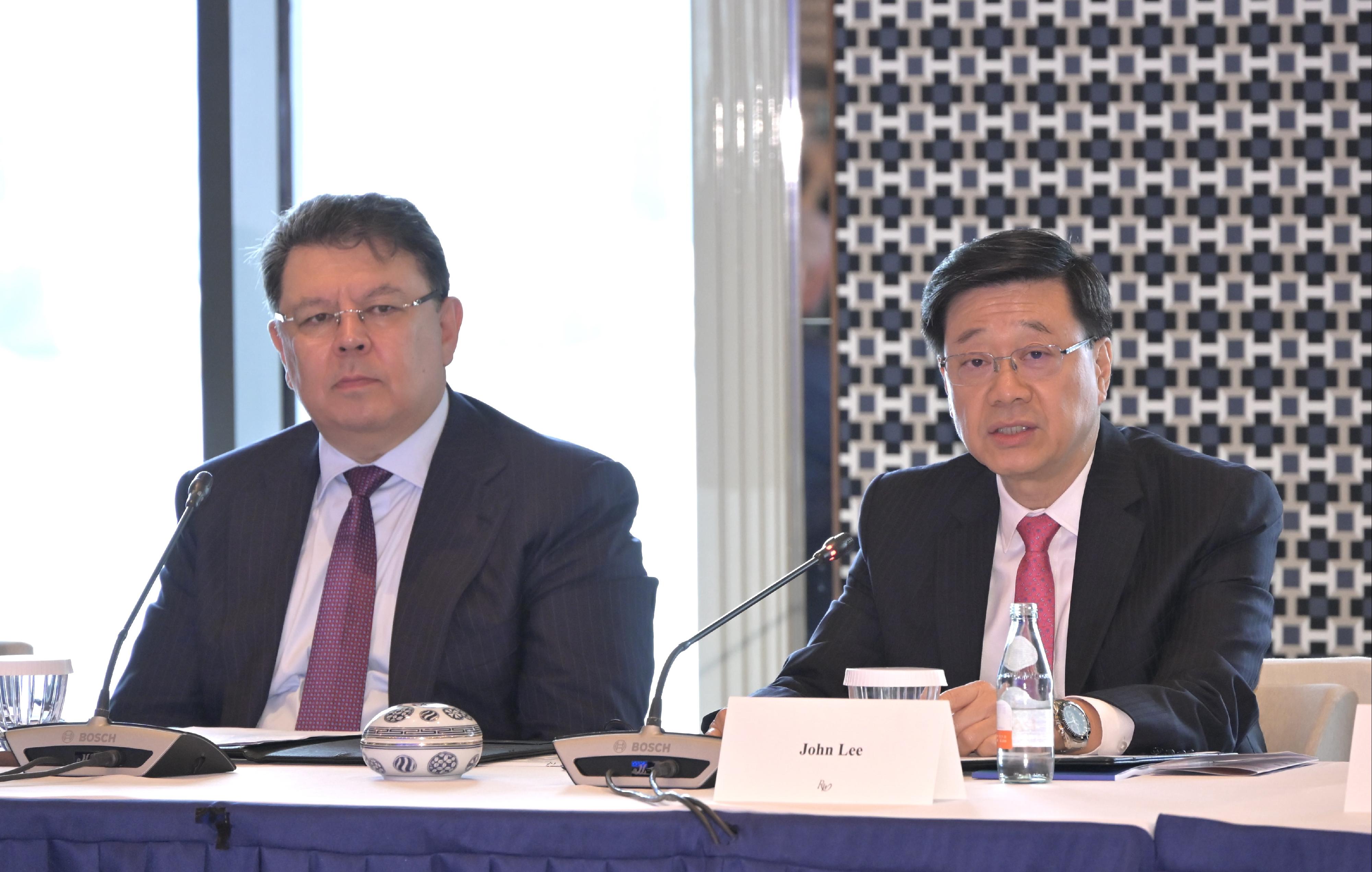 The Chief Executive, Mr John Lee (right), today (June 11) attends the Alatau City Investment Round Table. On his left is Deputy Prime Minister of Kazakhstan Mr Kanat Bozumbayev.