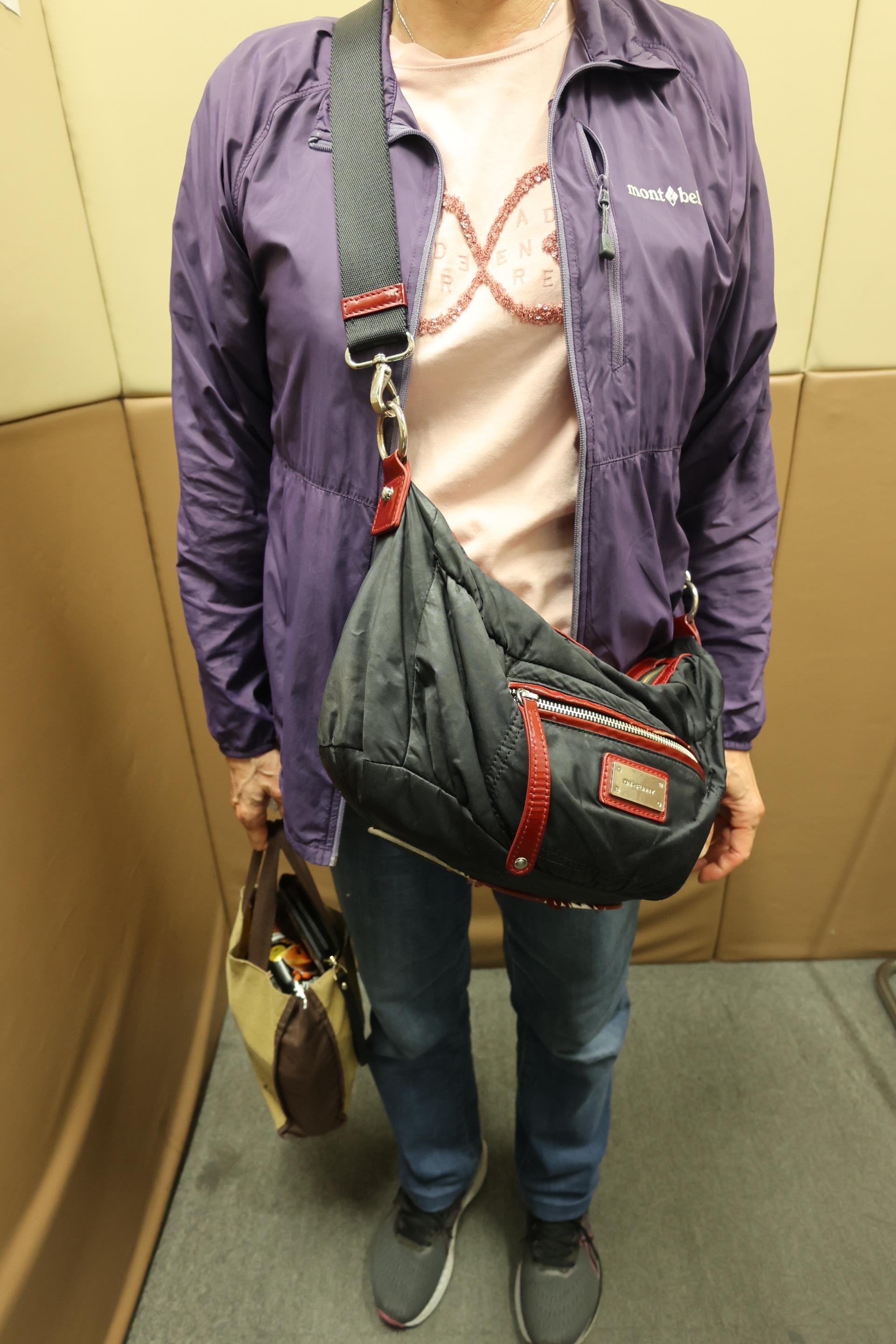 Three incoming passengers were sentenced to four weeks' to five months' imprisonment and fined $1,000 respectively by the Magistrates' Courts today (June 11) for possessing or importing duty-not-paid cigarettes and failing to declare them to Customs officers, in contravention of the Dutiable Commodities Ordinance. Photo shows a 69-year-old incoming female passenger who concealed the duty-not-paid cigarettes around her waist.
