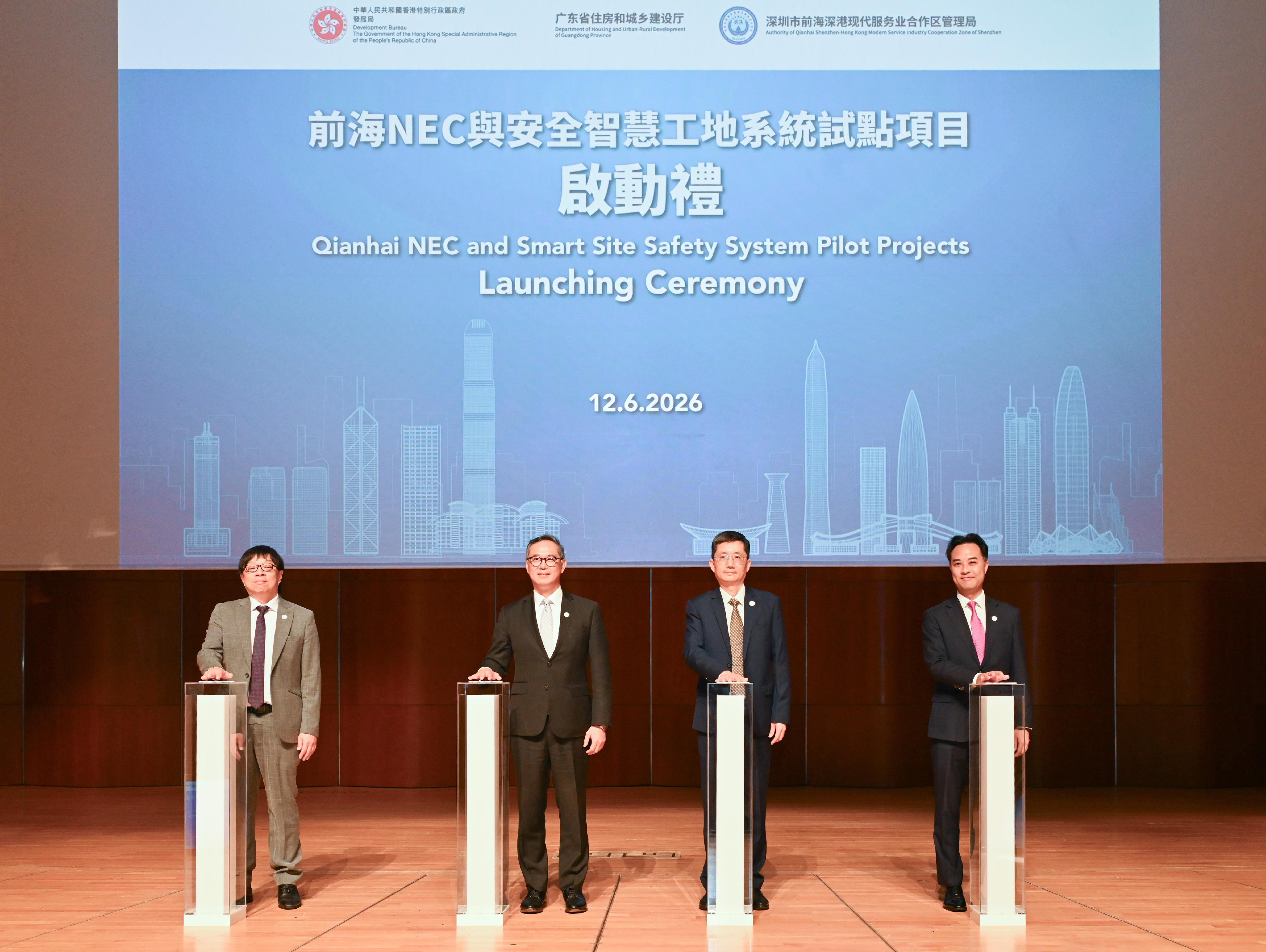 The Development Bureau, the Department of Housing and Urban-Rural Development of Guangdong Province (DHURDGP), and the Authority of Qianhai Shenzhen-Hong Kong Modern Service Industry Co-operation Zone of Shenzhen Municipality (Qianhai Authority) announced today (June 12) the launch of five pilot projects in Qianhai, which will adopt Hong Kong's New Engineering Contract form or the Smart Site Safety System. Photo shows (from left) Deputy Secretary for Development (Works) Mr Tony Ho; the Permanent Secretary for Development (Works), Mr Ricky Lau; Second-level Inspector of the DHURDGP Mr Huang Weide; and the Chief Hong Kong and Macao Liaison Expert of the Qianhai Authority, Mr Gary Wong, officiating at the launching ceremony.