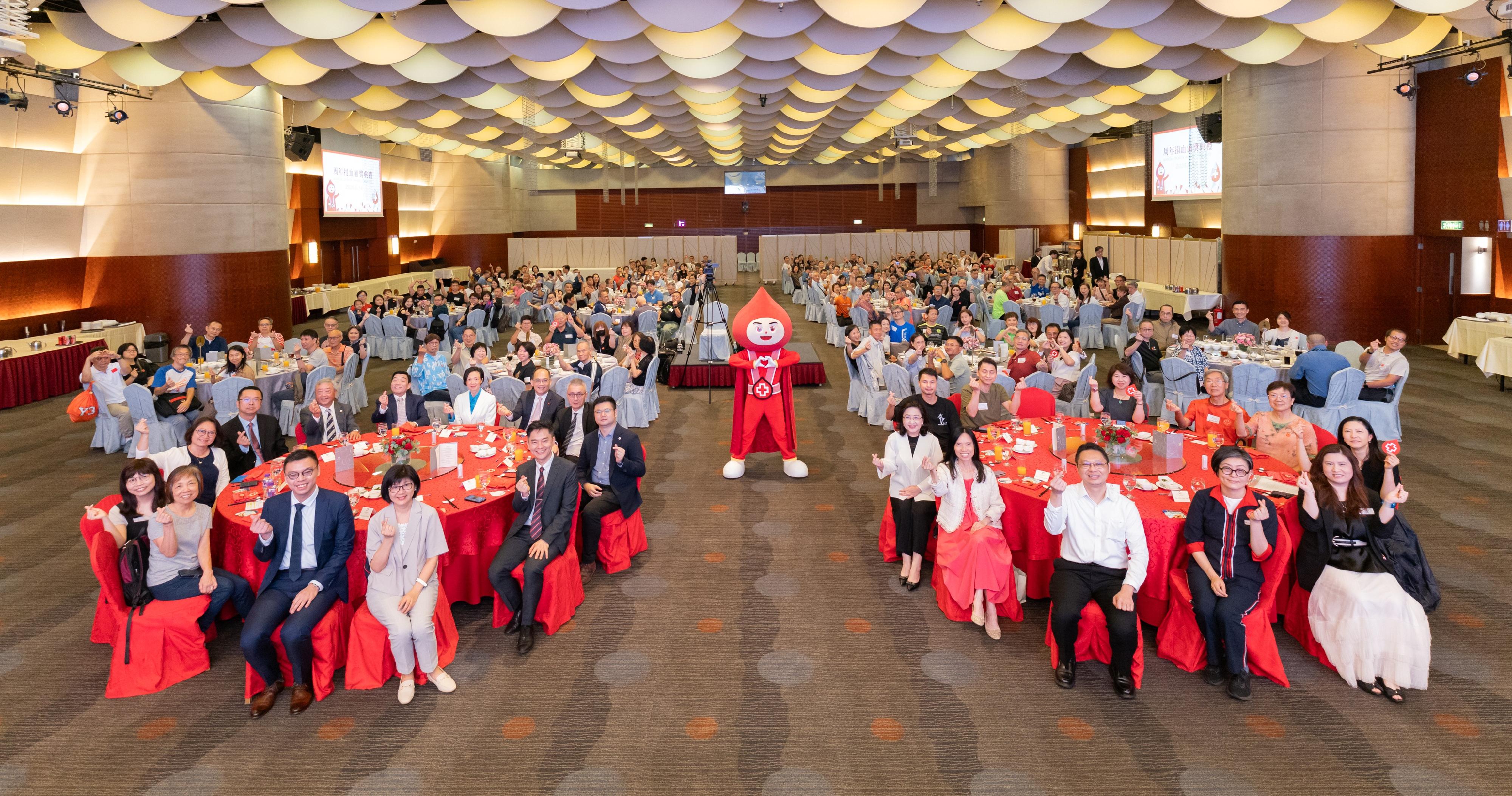 The Hong Kong Red Cross Blood Transfusion Service (BTS) today (June 14) held its Annual Donor Award Ceremony to commend outstanding regular blood donors. Photo shows officiating guests with the BTS mascot Captain Blood at the Annual Donor Award Ceremony.
