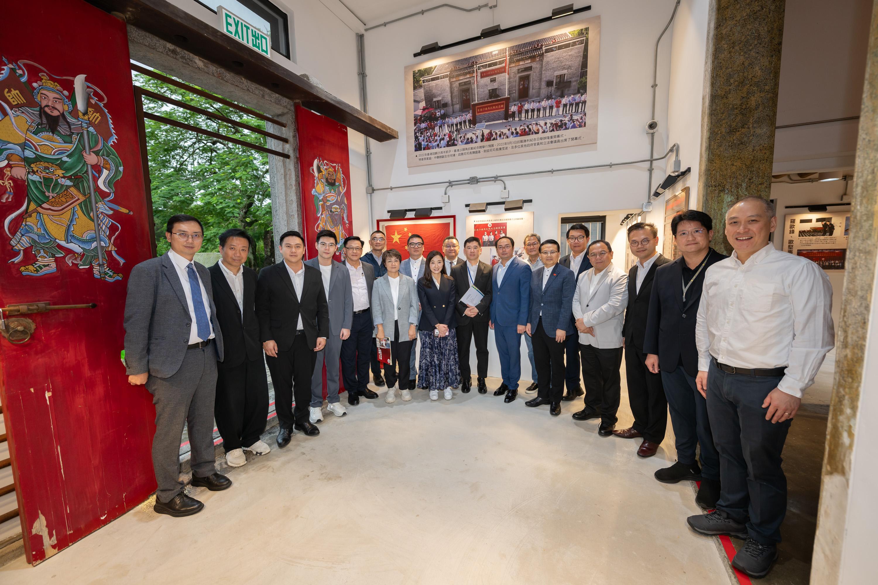 The Legislative Council Panel on Constitutional Affairs visited several patriotic education facilities today (June 15). Photo shows the Chairman of the Panel on Constitutional Affairs, Mr Chan Yung (sixth right), Deputy Chairman, Ir Lee Chun-keung (first left), other LegCo Members and the Under Secretary for Constitutional and Mainland Affairs, Mr Clement Woo (ninth right) posing for a group photo at the Sha Tau Kok Anti-War Memorial Hall (the Law's House).
