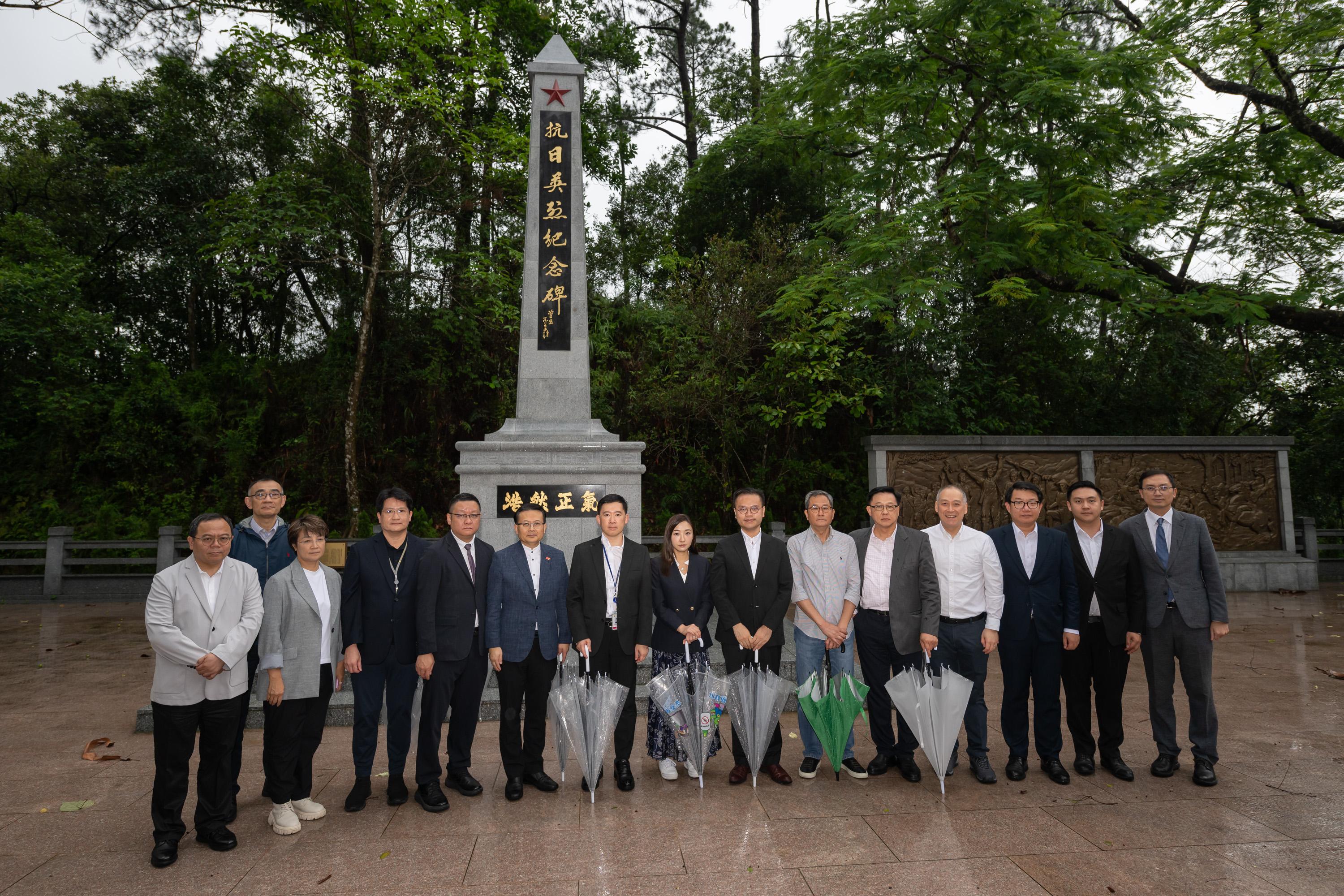 The Legislative Council Panel on Constitutional Affairs visited several patriotic education facilities today (June 15). Photo shows LegCo Members visiting the Cenotaph for Martyrs at Wu Kau Tang.