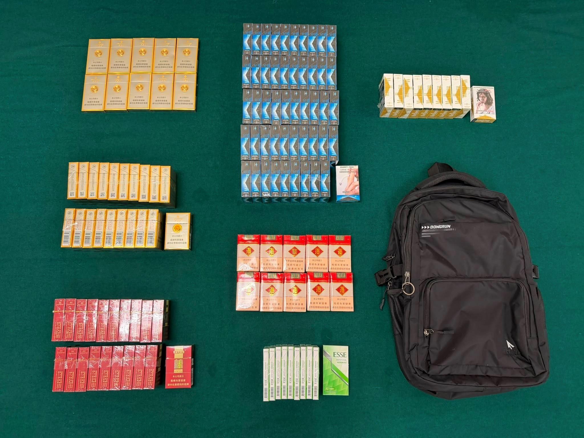 An incoming Chinese female passenger was sentenced to four weeks' imprisonment and fined $1,000 by the Fanling Magistrates' Courts today (June 16) for possessing duty-not-paid cigarettes and failing to declare them to Customs officers, in contravention of the Dutiable Commodities Ordinance. Photo shows the duty-not-paid cigarettes seized.