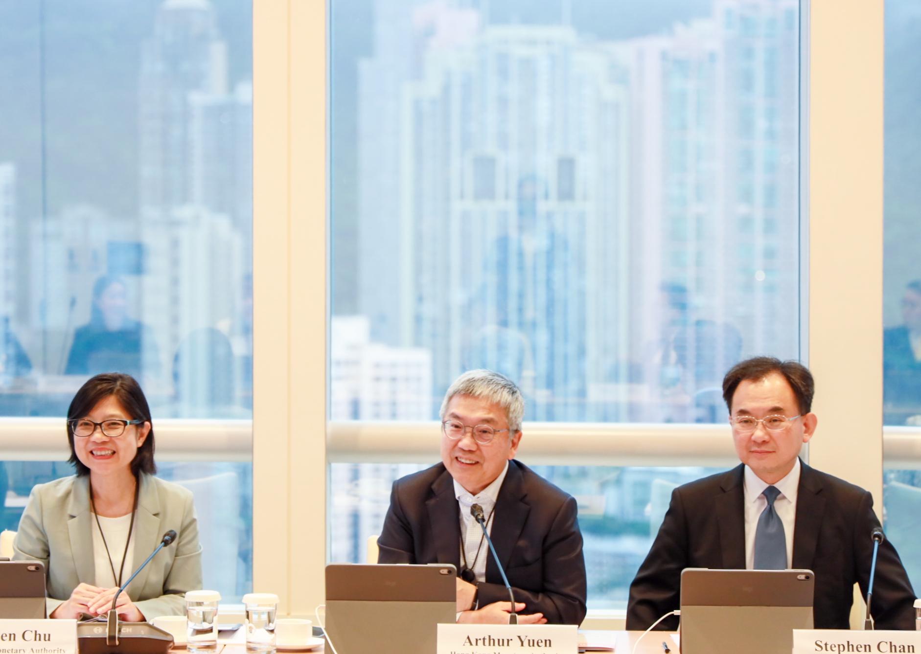 The meeting of the Northern Metropolis Financial Advisory Taskforce is co-chaired by Deputy Chief Executive of the Hong Kong Monetary Authority (HKMA), Mr Arthur Yuen (centre), and the Acting Chairman of The Hong Kong Association of Banks, Mr Stephen Chan (right). Executive Director (Banking Supervision) of the HKMA, Ms Carmen Chu (left), also attends the meeting.