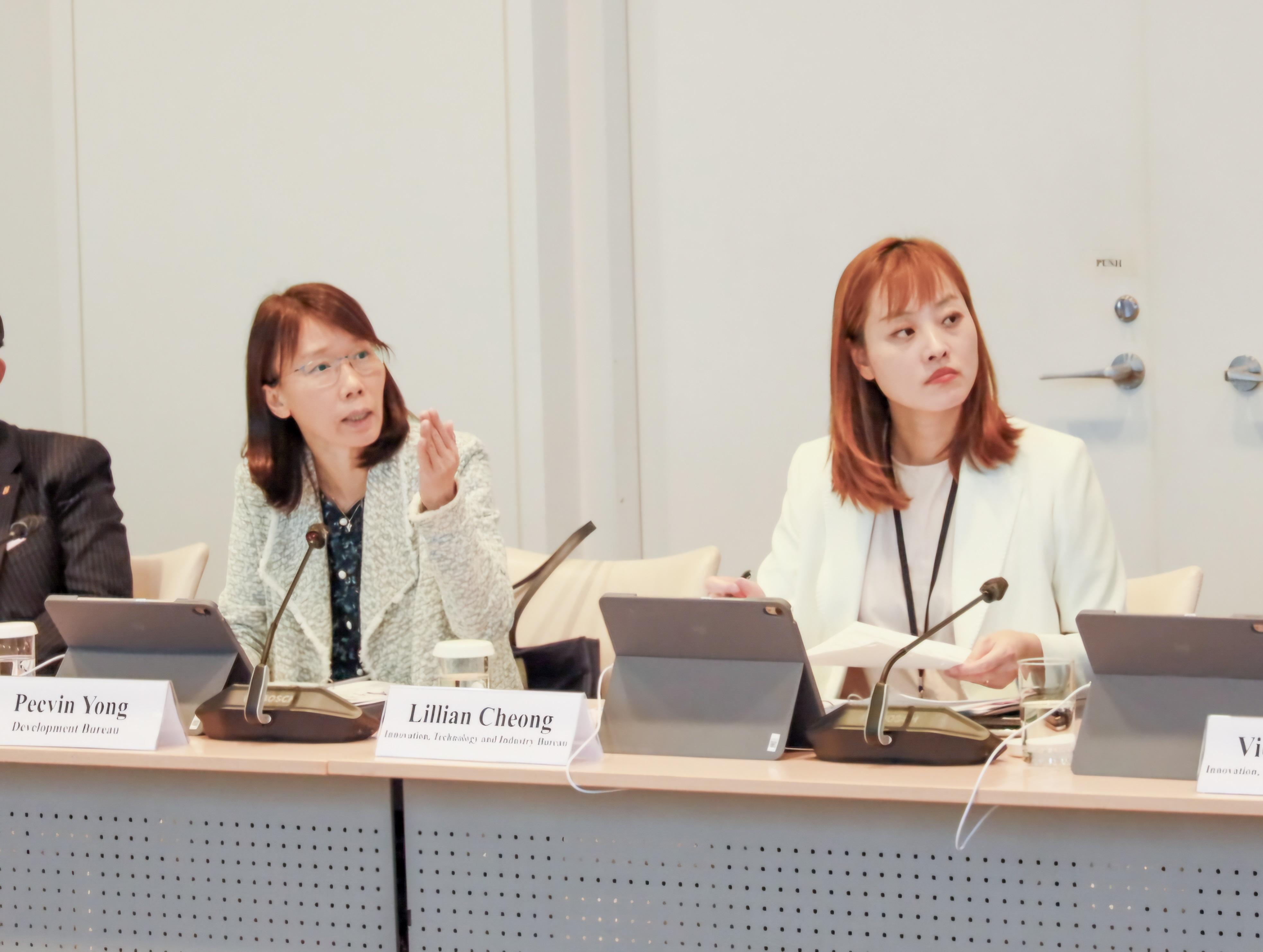 Deputy Secretary for Development (Planning and Lands), Ms Pecvin Yong (left), and the Under Secretary for Innovation, Technology and Industry, Ms Lillian Cheong (right), present on the key development projects and financing opportunities in the Northern Metropolis at the meeting of the Northern Metropolis Financial Advisory Taskforce.