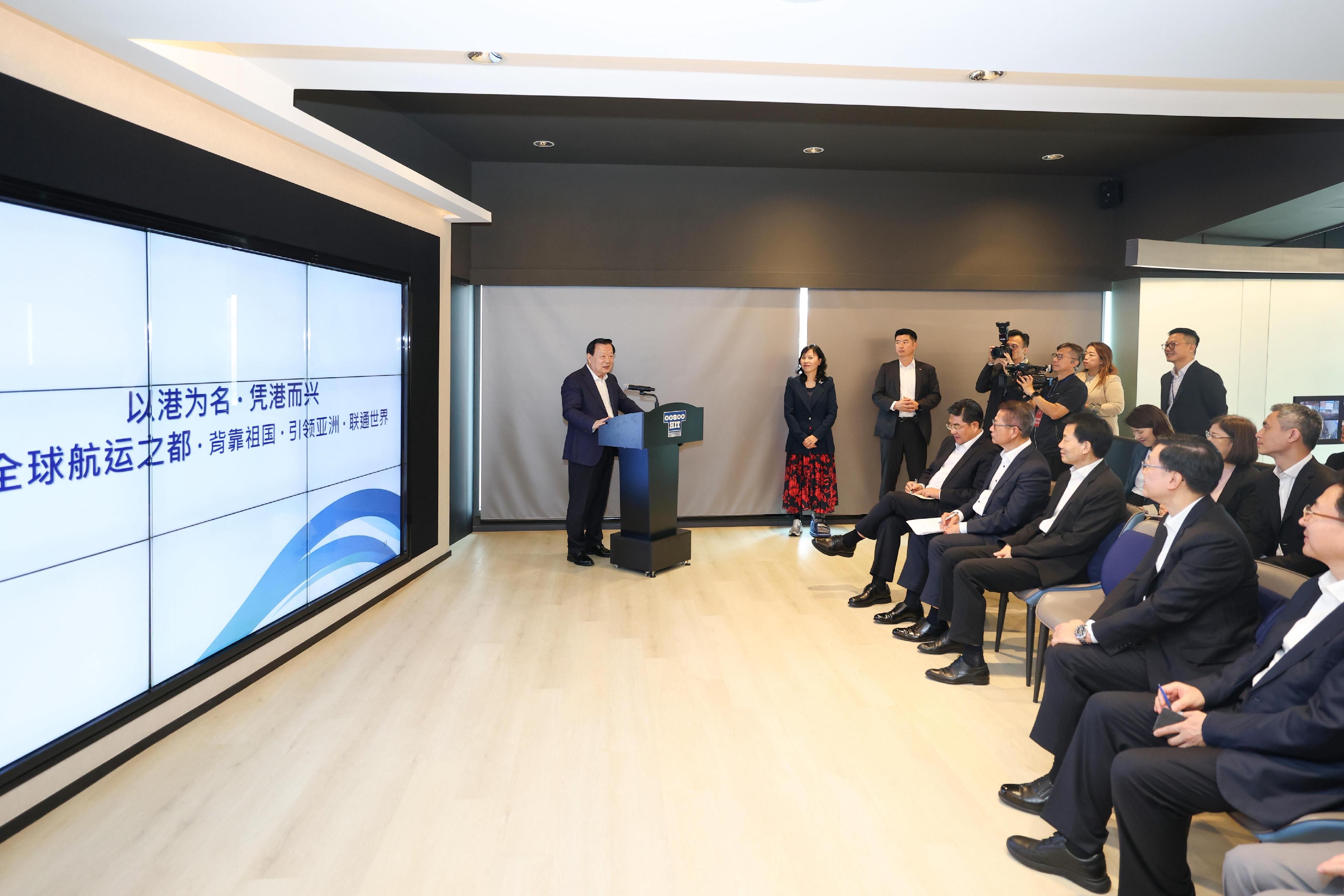 The Director of the Hong Kong and Macao Work Office of the Communist Party of China Central Committee and the Hong Kong and Macao Affairs Office of the State Council, Mr Xia Baolong (first left), today (June 17) visits Kwai Chung Container Terminal 8 in the company of the Chief Executive, Mr John Lee (second right), and exchanges views with the industry practitioners.