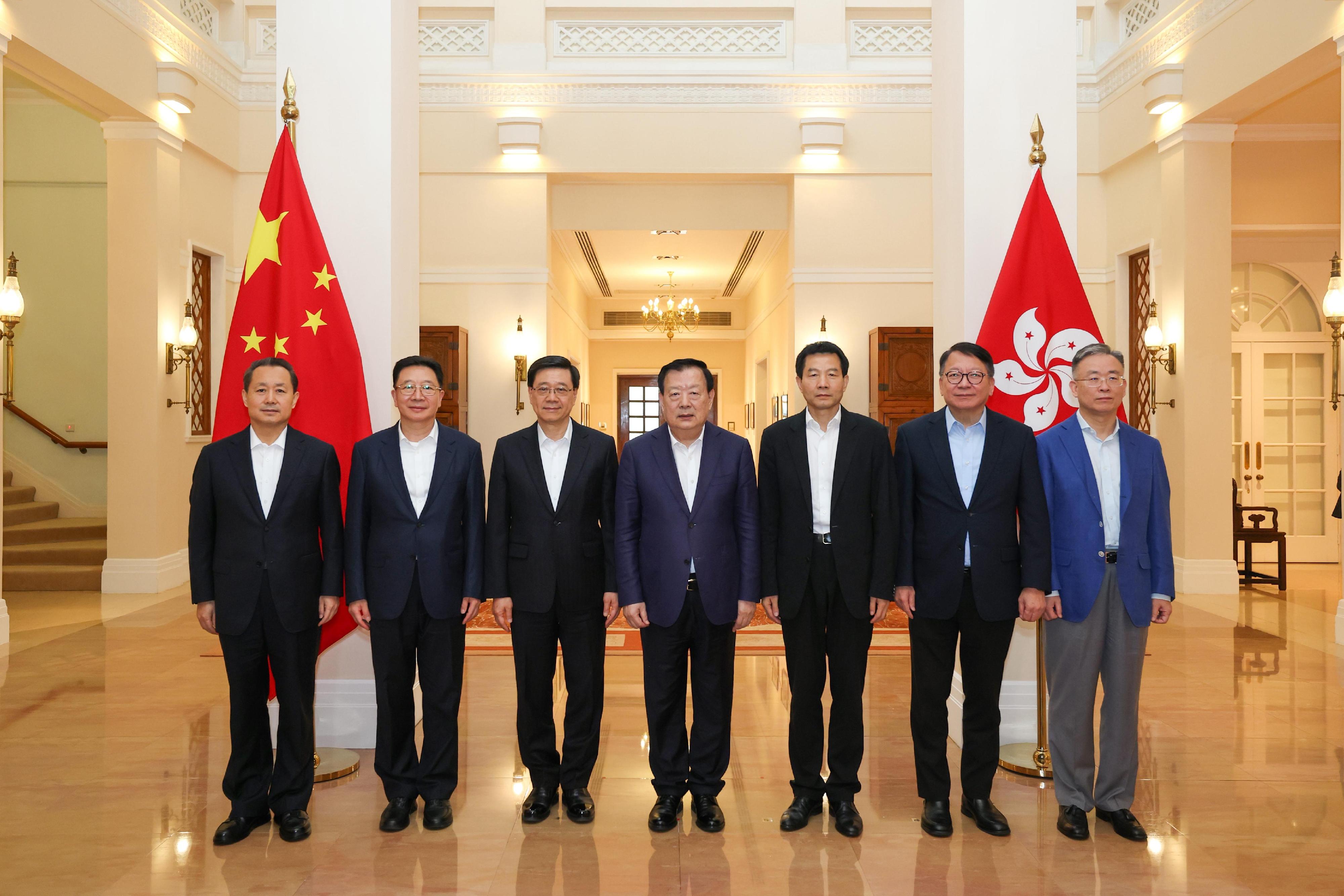 The Director of the Hong Kong and Macao Work Office of the Communist Party of China Central Committee and the Hong Kong and Macao Affairs Office of the State Council, Mr Xia Baolong (centre), today (June 17) meets with the Chief Executive, Mr John Lee (third left) at Government House.