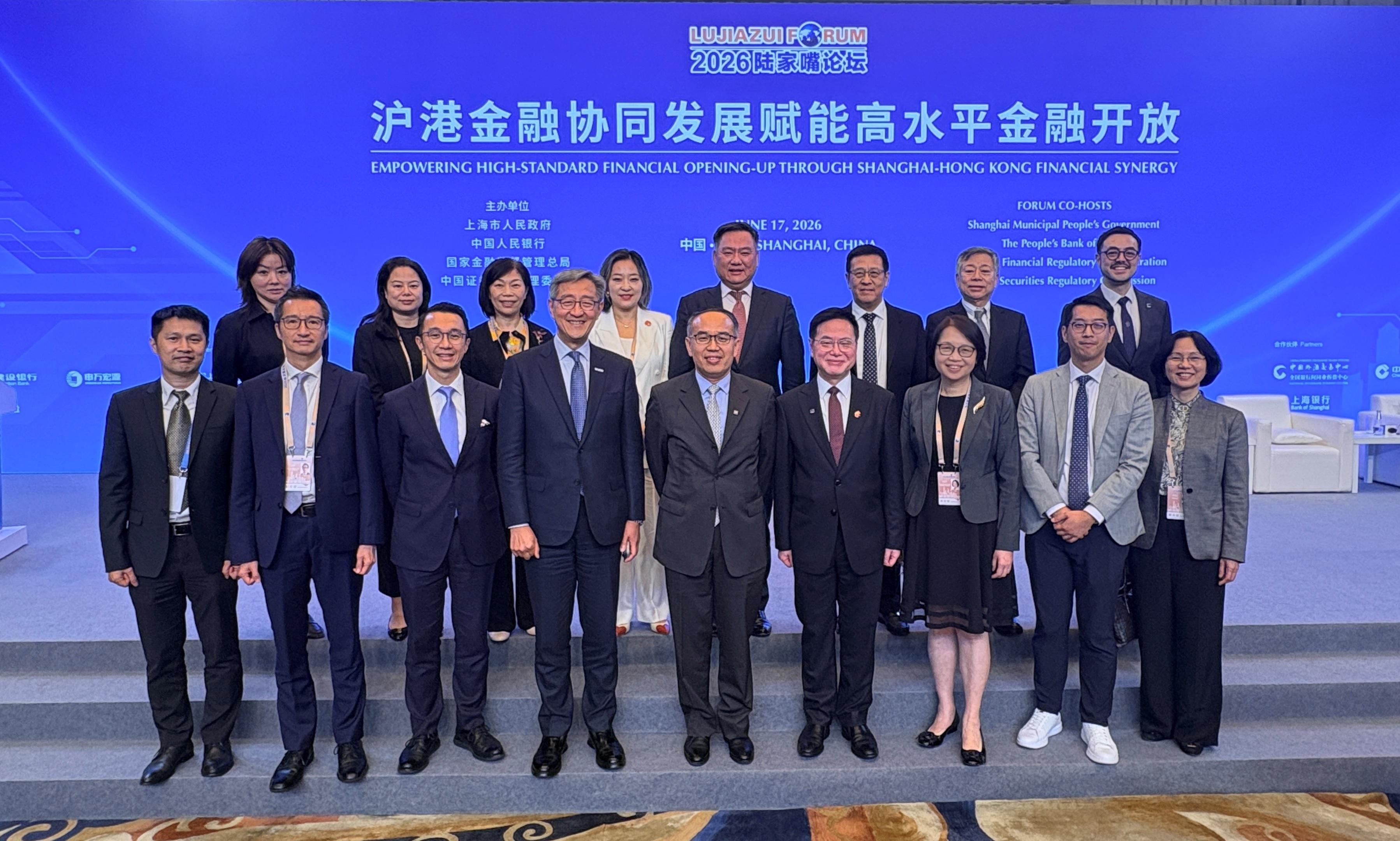 The Secretary for Financial Services and the Treasury, Mr Christopher Hui, and the financial delegation attended the 2026 Lujiazui Forum in Shanghai yesterday (June 17). Photo shows Mr Hui (front row, centre); the Permanent Secretary for Financial Services and the Treasury (Financial Services), Mrs Angelina Cheung (front row, third right); the Director-General of the Office for Attracting Strategic Enterprises, Mr Peter Yan (front row, fourth left); the Executive Director of the Financial Services Development Council, Dr Rocky Tung (front row, third left), and members of the delegation at the Forum venue.
