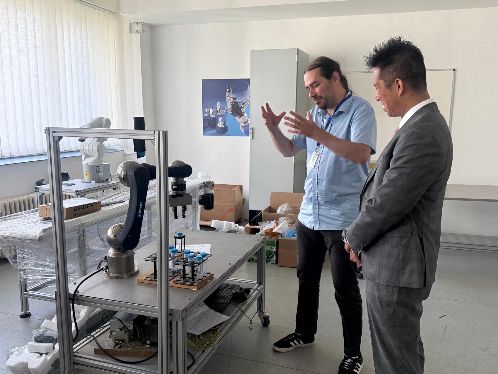 The Hong Kong Economic and Trade Office, Berlin (HKETO Berlin) supported a Hong Kong Productivity Council delegation visit to Bratislava, the Slovak Republic, on June 16 and 17 (Bratislava time). Photo shows the Director of the HKETO Berlin, Mr Indiana Wong (right), visiting the Slovak University of Technology in Bratislava.