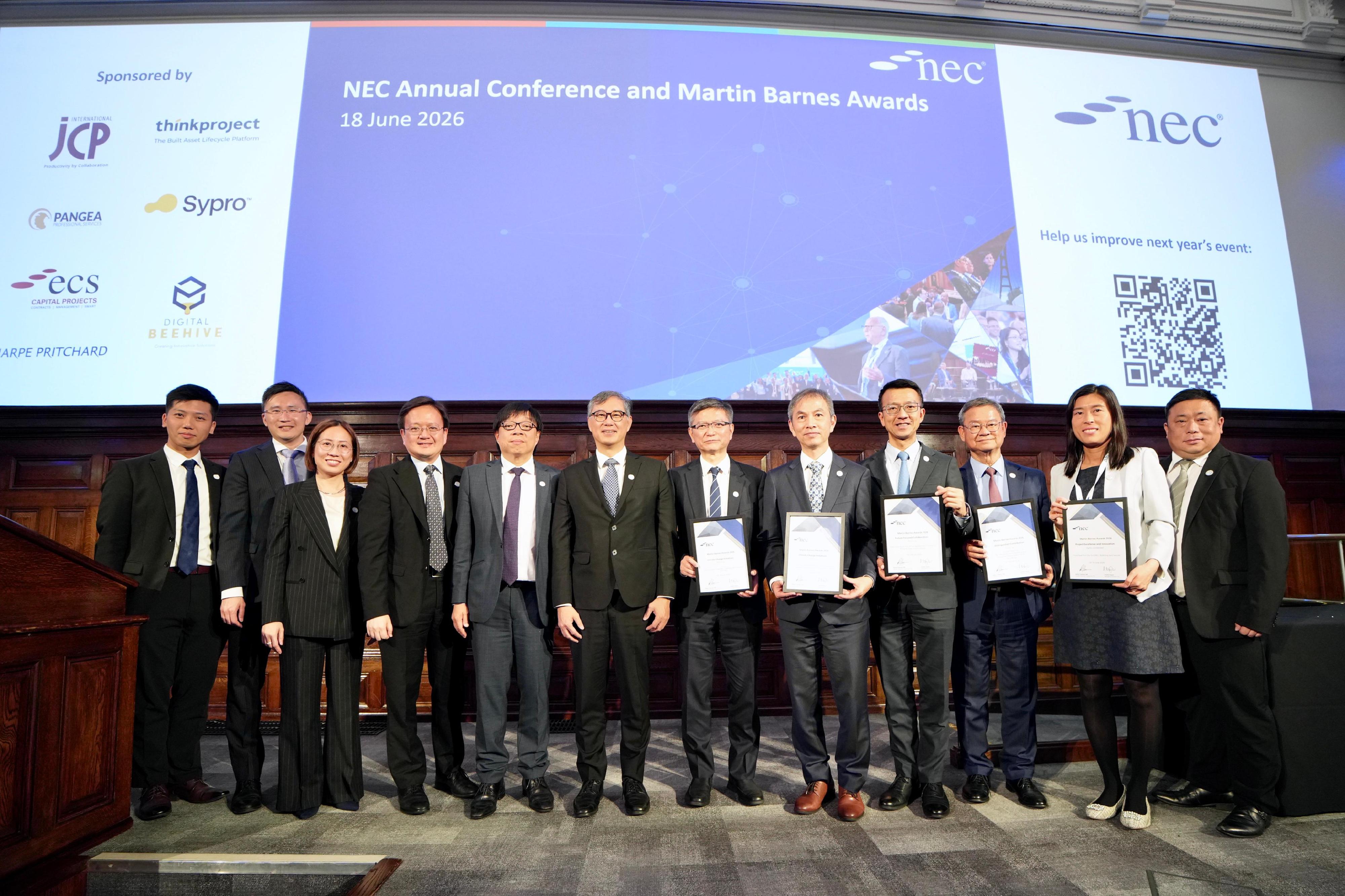 The Civil Engineering and Development Department (CEDD) competed for the 2026 Martin Barnes Awards with several New Engineering Contract-based infrastructure projects and won five awards. Photo shows the Permanent Secretary for Development (Works), Mr Ricky Lau (sixth left), with awardees and representatives of the CEDD at the awards presentation ceremony held today (June 18, London time) in London, the United Kingdom.
