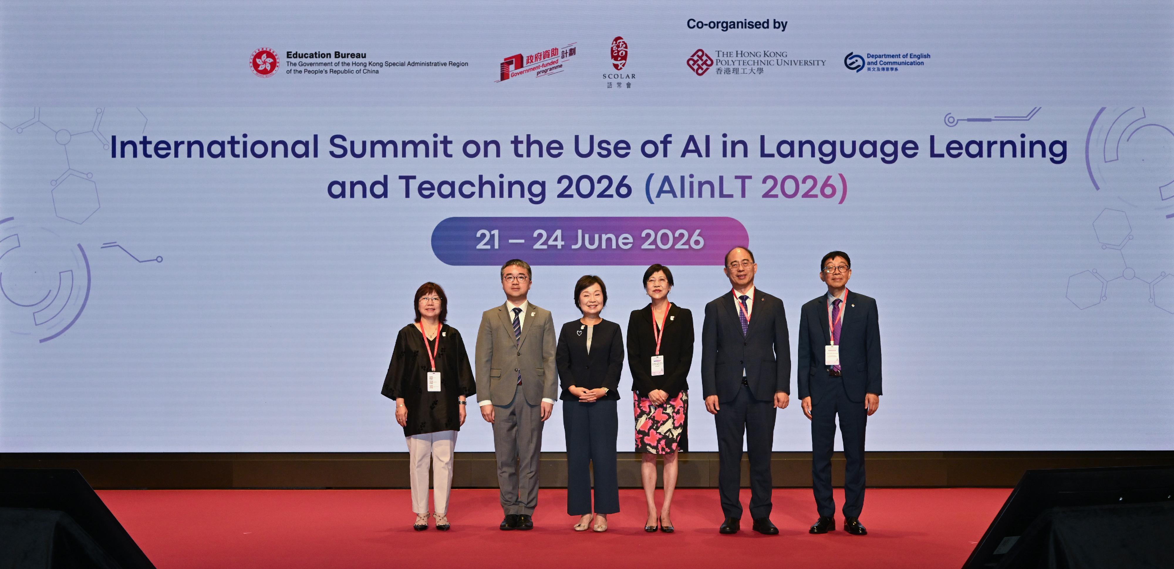 The second Digital Education Week is held from today (June 21) until June 27, with the first highlight event being the International Summit on the Use of AI in Language Learning and Teaching 2026. Photo shows the Secretary for Education, Dr Choi Yuk-lin (third left); the Chairperson of the Standing Committee on Language Education and Research, Dr Anissa Chan (third right); the Deputy President and Provost of the Hong Kong Polytechnic University (PolyU), Profssor Wong Wing-tak (second right); the Vice President (Education) of PolyU, Professor Cao Jiannong (first right); the Under Secretary for Education and Chairperson of the Steering Committee on Strategic Development of Digital Education, Dr Sze Chun-fai (second left); and Deputy Secretary for Education Dr Gloria Chan (first left), in a group photo at the opening ceremony of the Summit.