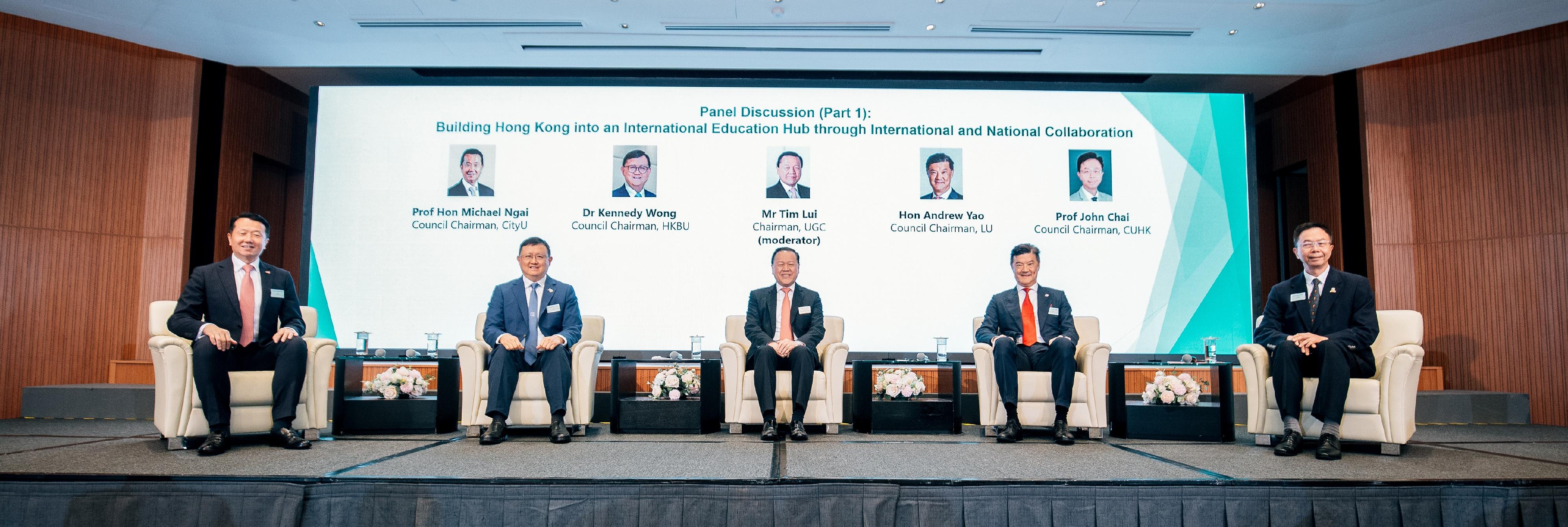 The University Grants Committee (UGC) held the University Leadership Forum 2026 today (June 22) to introduce its latest initiatives to council members and senior management of the eight UGC-funded universities, and to facilitate an exchange of views with representatives of university councils on the development of higher education in Hong Kong. Photo shows (from left) the Council Chairman of City University of Hong Kong, Professor Michael Ngai; the Council Chairman of Hong Kong Baptist University, Dr Kennedy Wong; the Chairman of the UGC, Mr Tim Lui; the Council Chairman of Lingnan University, Mr Andrew Yao; and the Council Chairman of the Chinese University of Hong Kong, Professor John Chai, participating in a panel discussion.