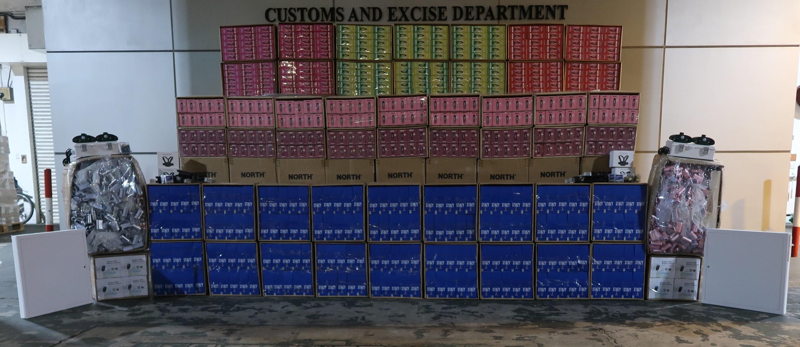 Hong Kong Customs on June 12 seized large batches of suspected smuggled goods, with an estimated market value of about $16 million, at the Tuen Mun River Trade Terminal Customs Cargo Examination Compound. Photo shows the suspected smuggled goods seized.