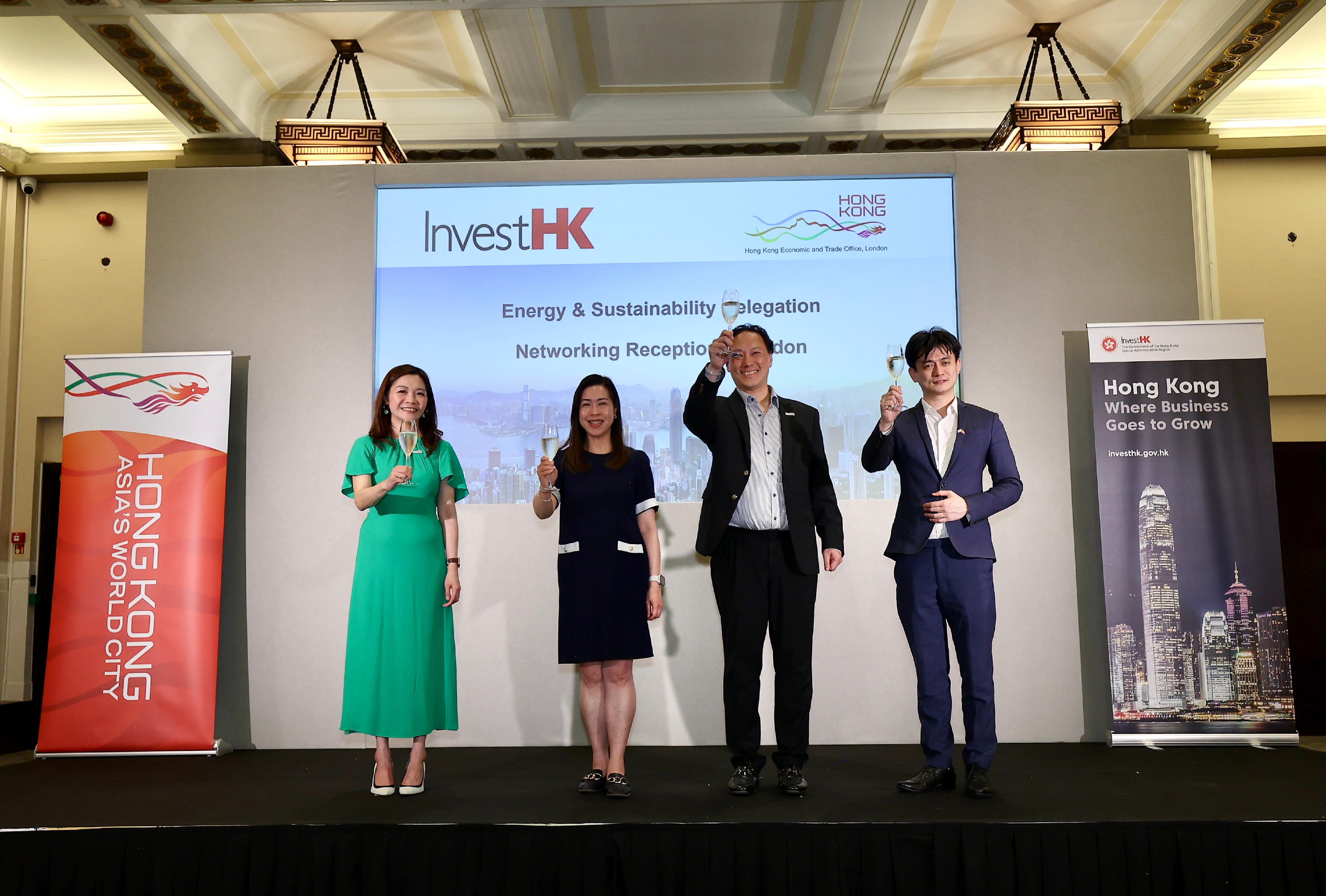 Invest Hong Kong (InvestHK) led its first New Energy and Sustainability Mission to the United Kingdom (UK) from June 16 to 24 (London time), co-organised with the UK's Department for Business and Trade. Photo shows (from left) the Head of Business and Talent Attraction/Investment Promotion of the InvestHK London Office, Ms Daisy Ip; the Director-General of the Hong Kong Economic and Trade Office in London, Miss Fiona Chau; the Global Head of Financial Services, Fintech and Sustainability of InvestHK, Mr King Leung; and the UK's Department for Business and Trade, Associate Director - Energy & Transport, Mr Cheng Kam Yu, at the networking receptions in London on June 23 with guests.