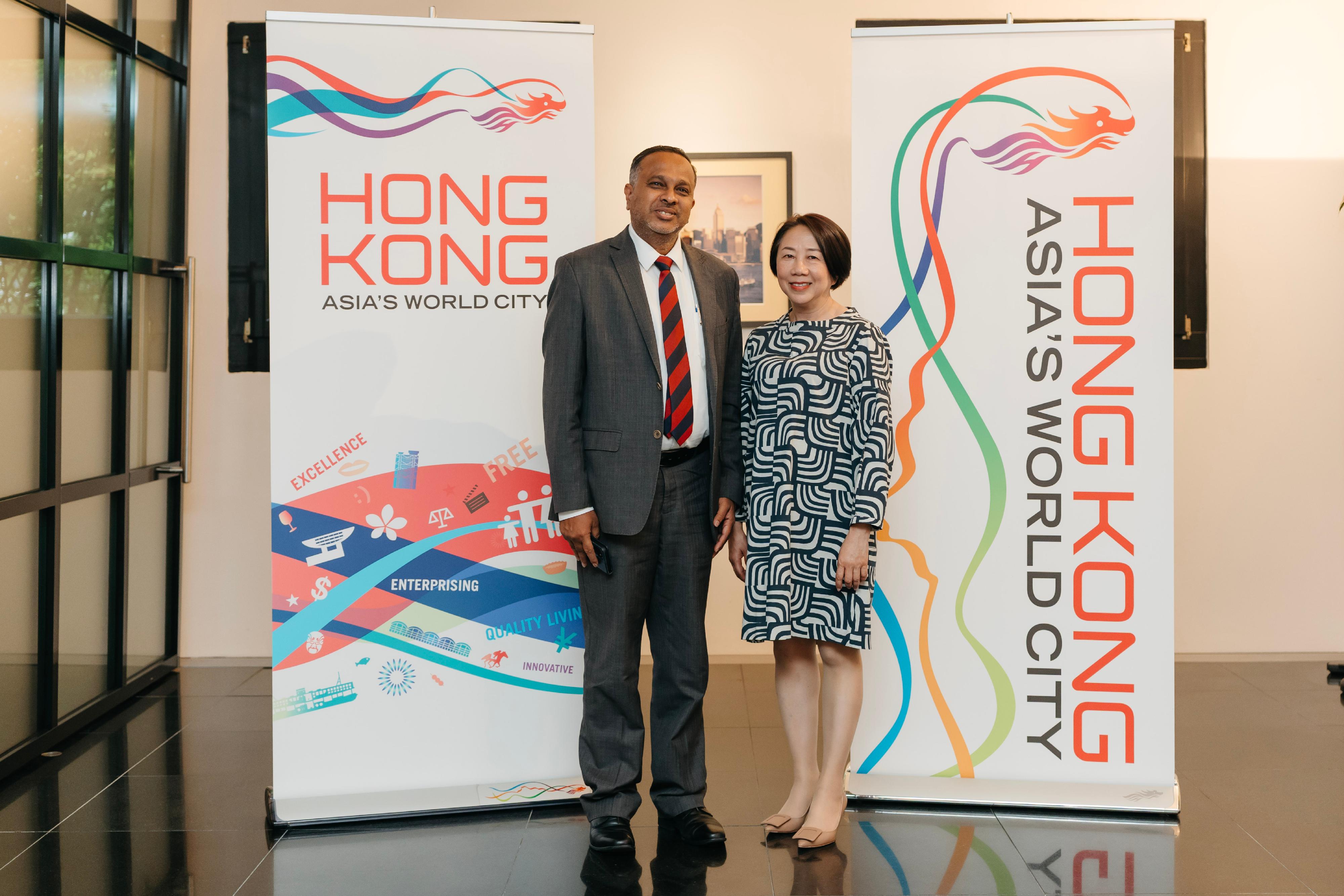 The Permanent Representative of the Hong Kong Special Administrative Region of China to the World Trade Organization (WTO), Miss Winky So (right), pictured at the reception with the Ambassador and Permanent Representative of the Permanent Mission of the Democratic Socialist Republic of Sri Lanka to the WTO, Mr R.G.S.P.K. Wijesekara (left). Ambassador Wijesekara is the current Chairperson of the WTO Committee on Balance-of-Payments Restrictions.