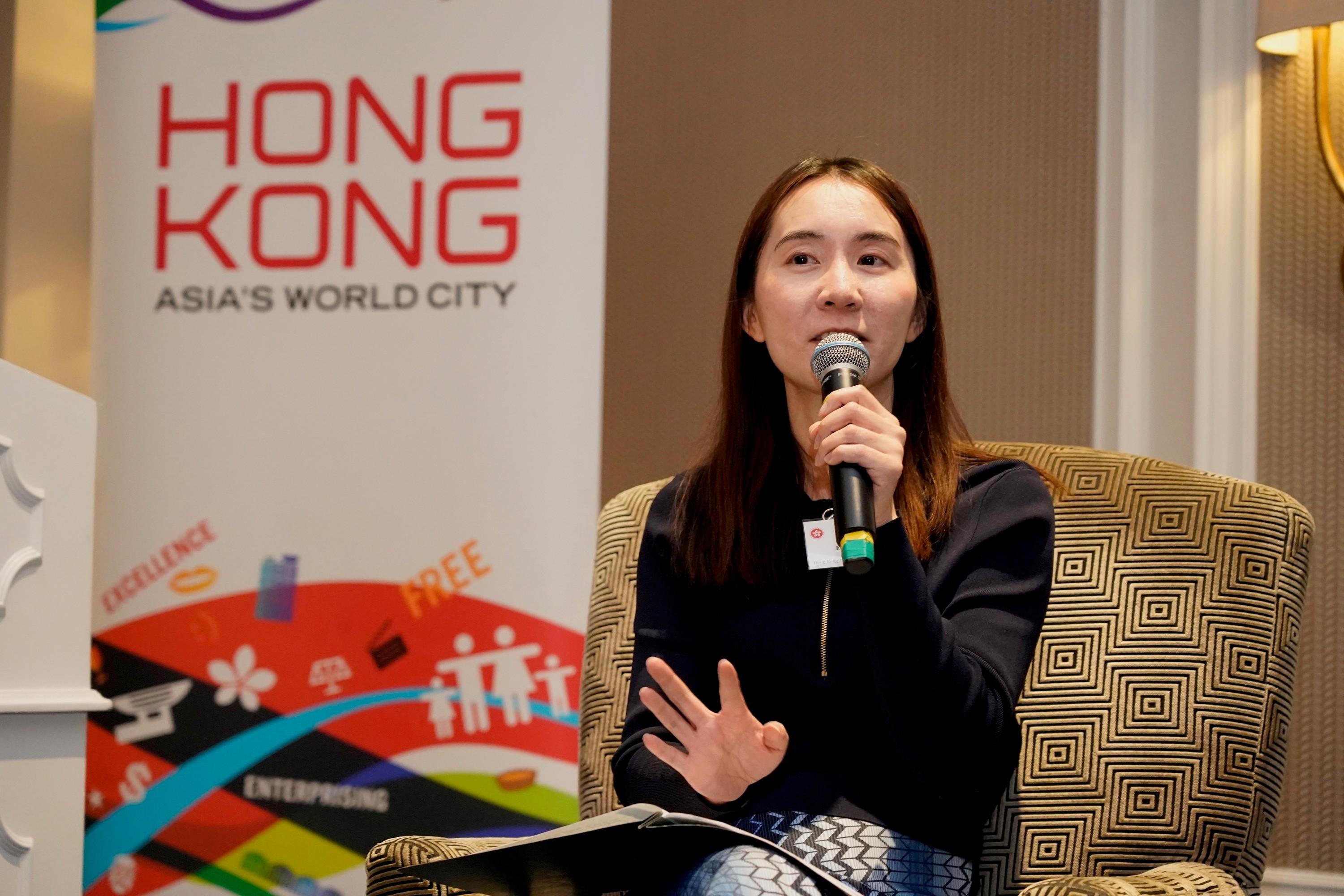 The Director of the HKETO, Washington DC, Ms Elania Luk, moderates a panel discussion on Hong Kong's role as a global centre for finance and trade.