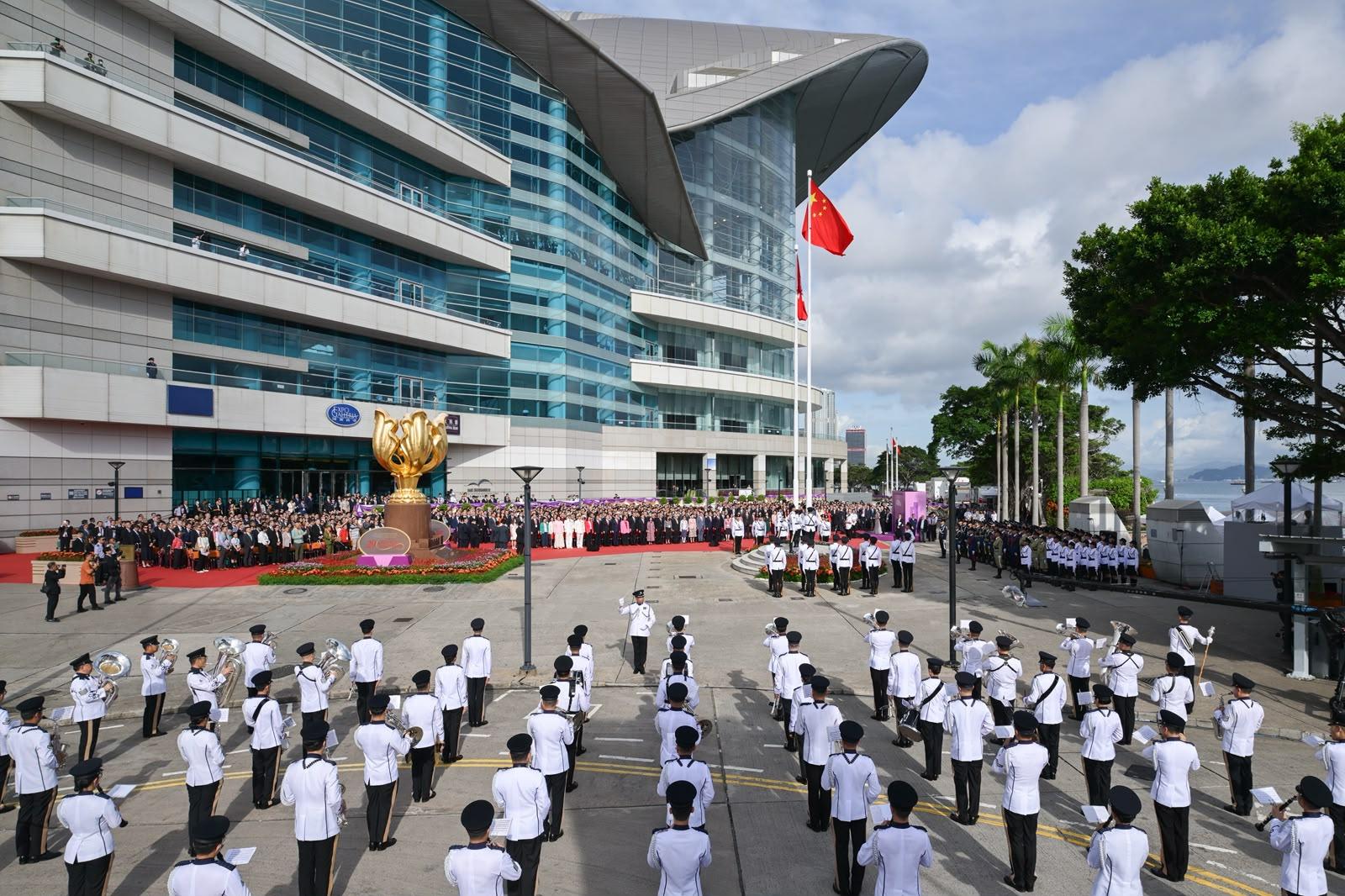 The Chief Executive, Mr John Lee, together with Principal Officials and guests, attends the flag-raising ceremony for the 29th anniversary of the establishment of the Hong Kong Special Administrative Region at Golden Bauhinia Square in Wan Chai this morning (July 1).