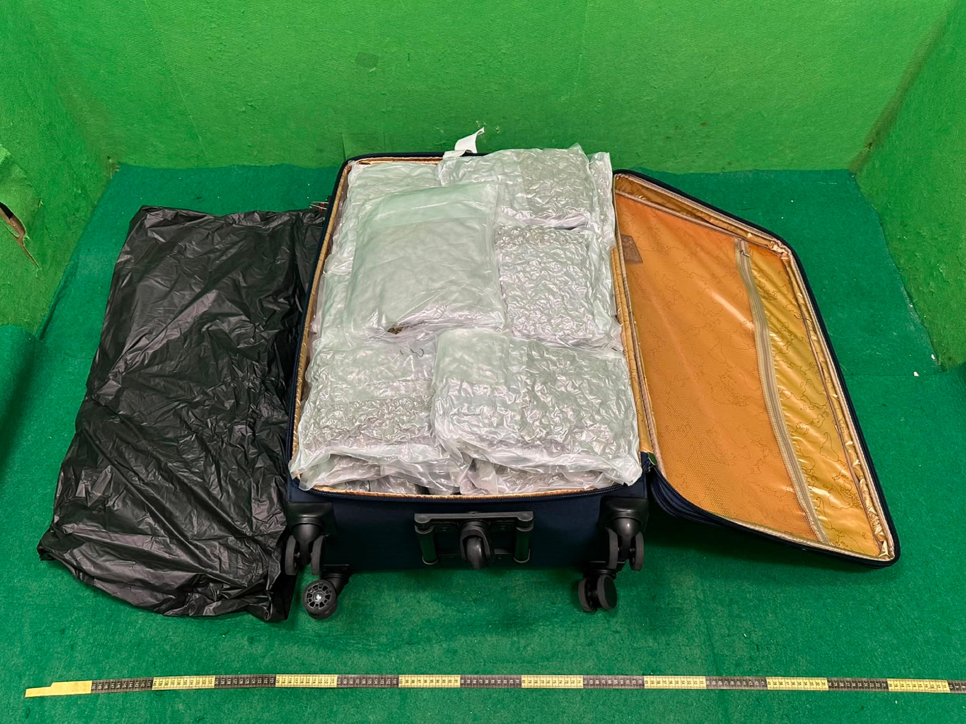 Hong Kong Customs detected a drug trafficking case involving baggage concealment at Hong Kong International Airport on July 3 and seized about 22 kilograms of suspected cannabis buds with an estimated market value of about $4 million. Photo shows the suspected cannabis buds seized in the case.