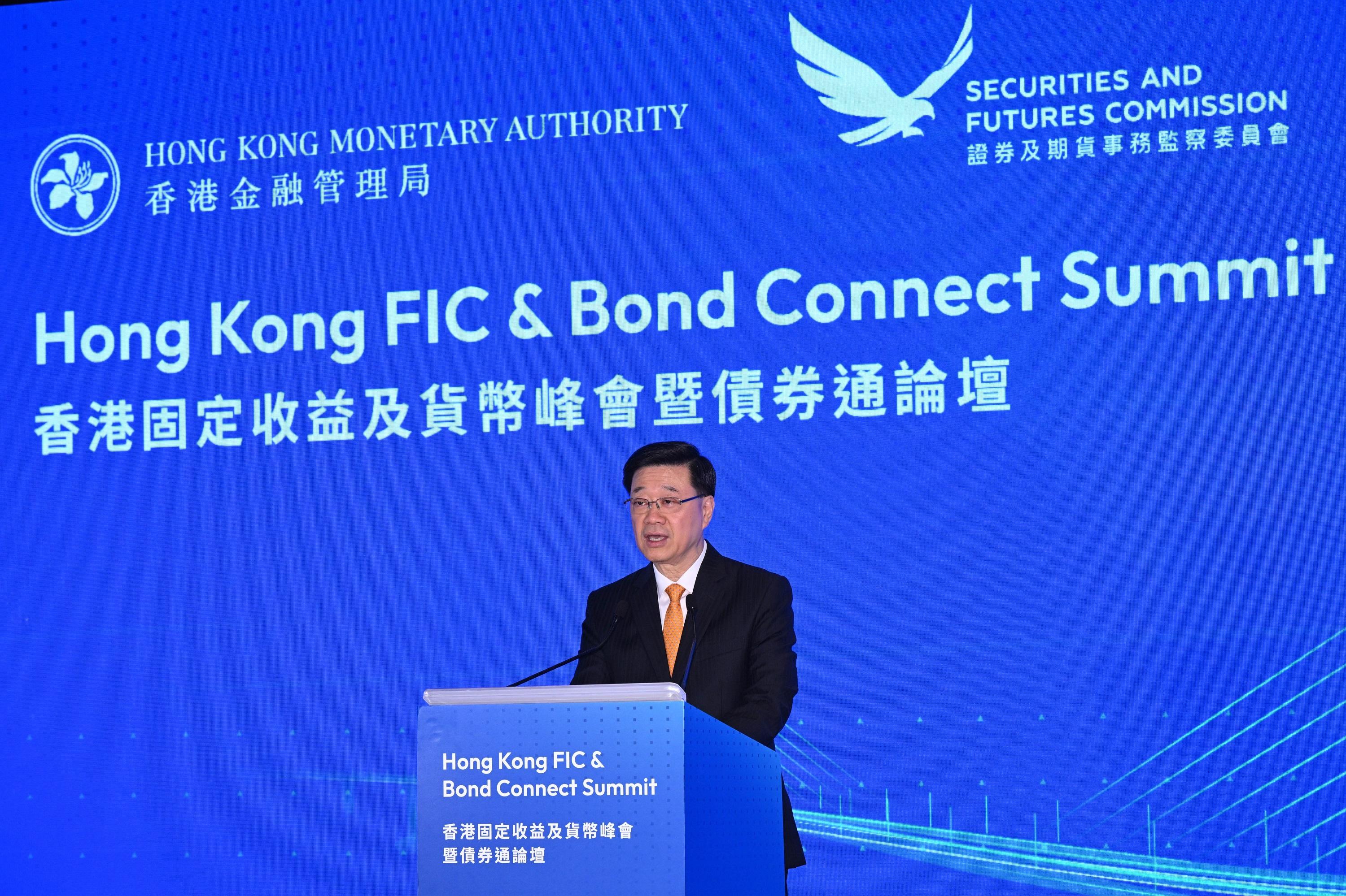 The Chief Executive, Mr John Lee, speaks at the Hong Kong FIC & Bond Connect Summit today (July 7).