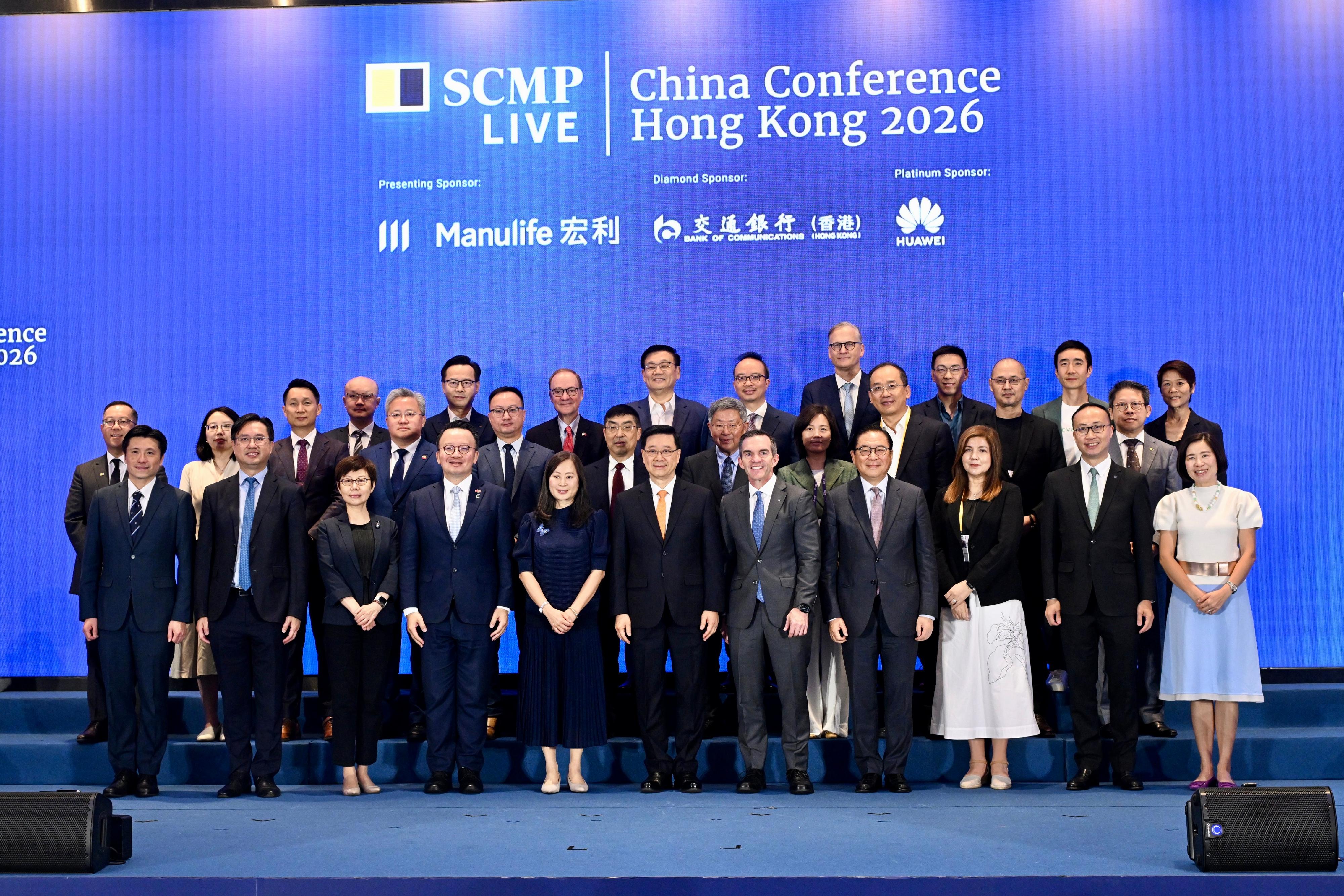 The Chief Executive, Mr John Lee, attended the South China Morning Post China Conference 2026 today (July 7). Photo shows (first row, from fifth right) the President and Chief Executive Officer of Manulife Asia, Mr Steve Finch; Mr Lee; the Publisher of the South China Morning Post, Ms Tammy Tam, and other guests at the conference.