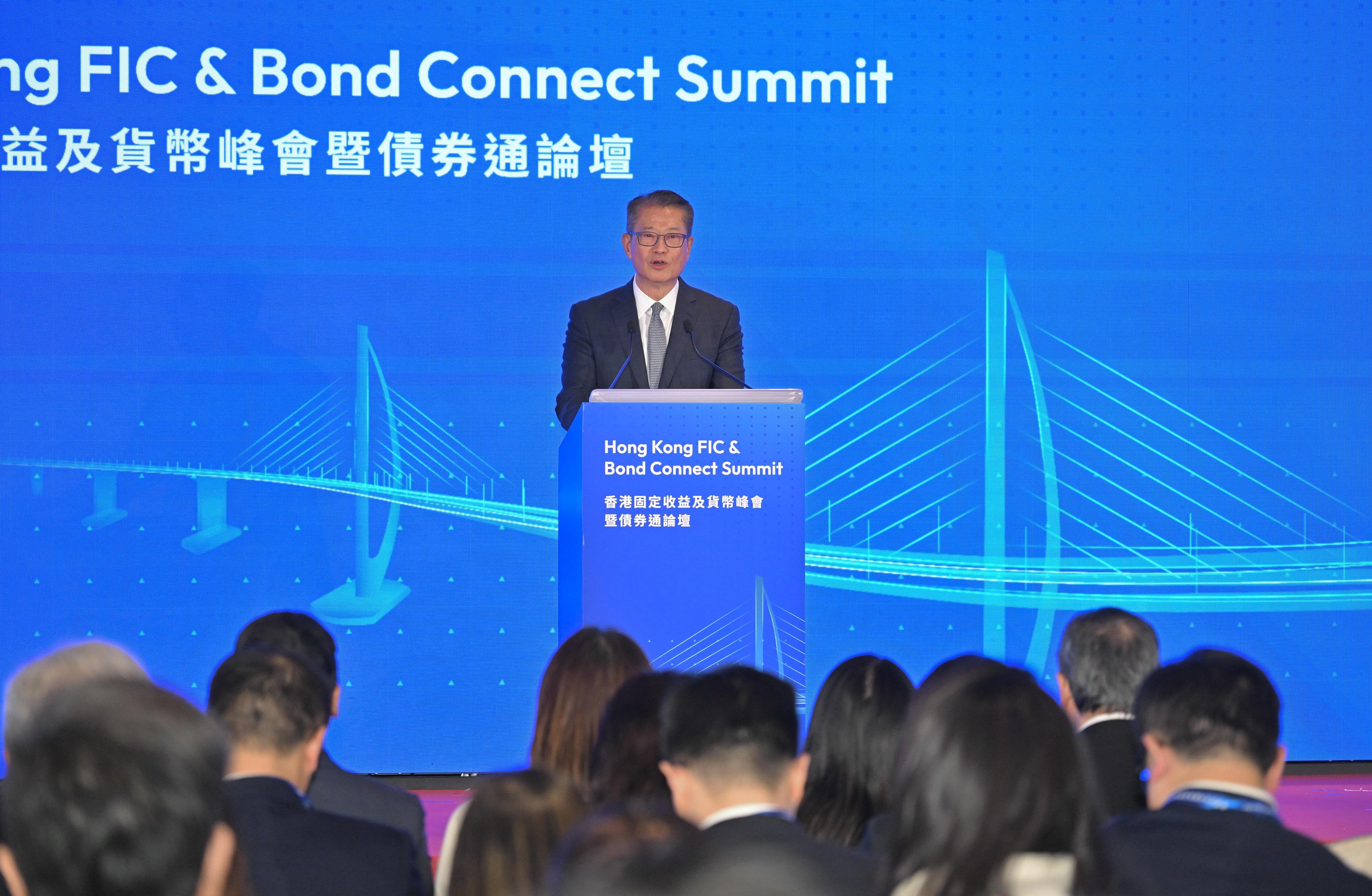 The Financial Secretary, Mr Paul Chan, speaks at the Hong Kong FIC & Bond Connect Summit today (July 7).