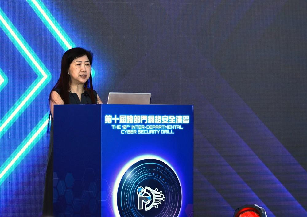 The Cyber Security and Technology Crime Bureau of the Hong Kong Police Force and the Digital Policy Office (DPO) jointly held the 10th Inter-departmental Cyber Security Drill today (July 7). Photo shows the Assistant Commissioner (Project Governance and Cybersecurity) of the DPO, Ms Candy Chan, addressing the event.