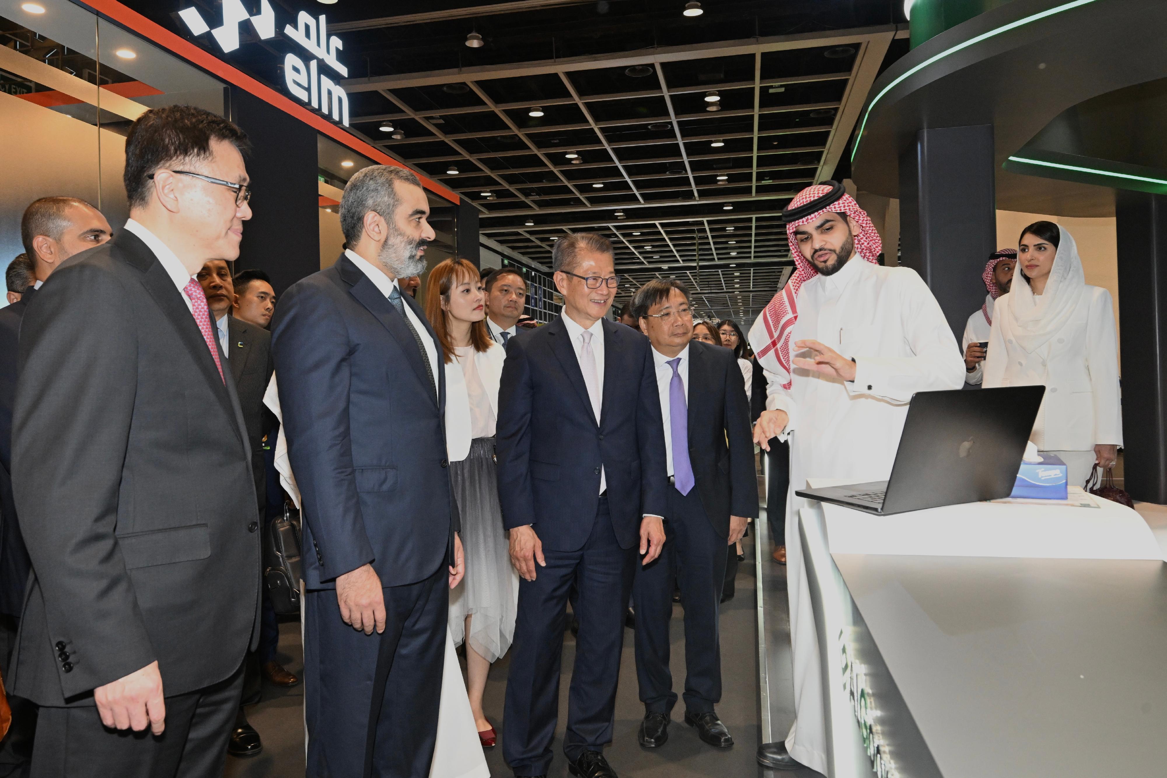 The Financial Secretary, Mr Paul Chan, attended the LEAP East 2026 opening ceremony today (July 8). Photo shows (from front row first left) the Secretary for Innovation, Technology and Industry, Professor Sun Dong; the Minister of Communications and Information Technology of Saudi Arabia, Mr Abdullah Alswaha; Mr Chan and other guests touring an exhibition booth.