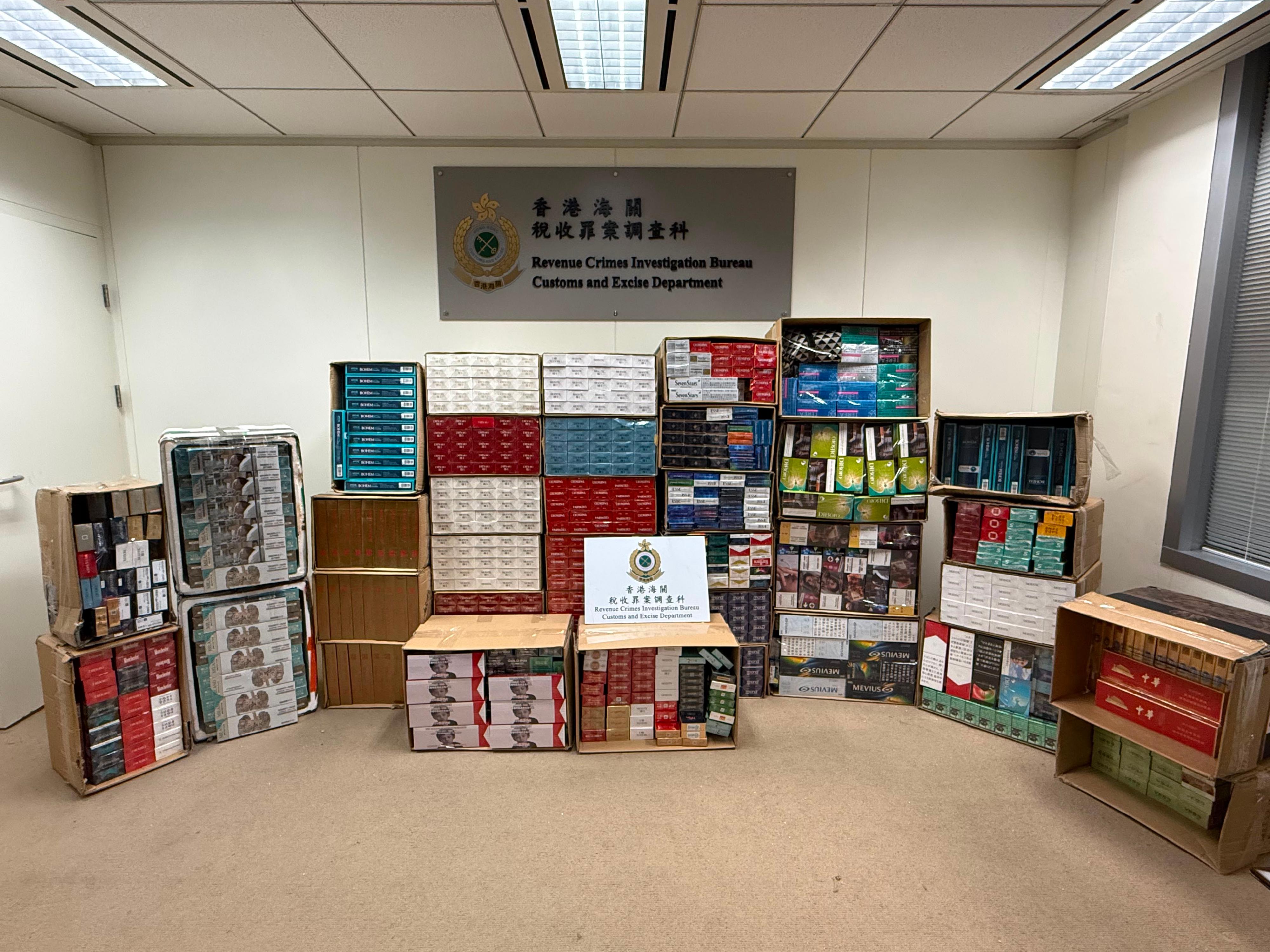 Hong Kong Customs detected a suspected illicit cigarette and alternative smoking product storage and distribution case in Ma On Shan yesterday (July 7). A total of about 390 000 suspected illicit cigarettes and 15 000 alternative smoking products were seized. The total estimated market value was about $1.78 million while the duty potential was about $1.3 million. A local man was arrested. Photo shows the suspected illicit cigarettes and alternative smoking products seized.