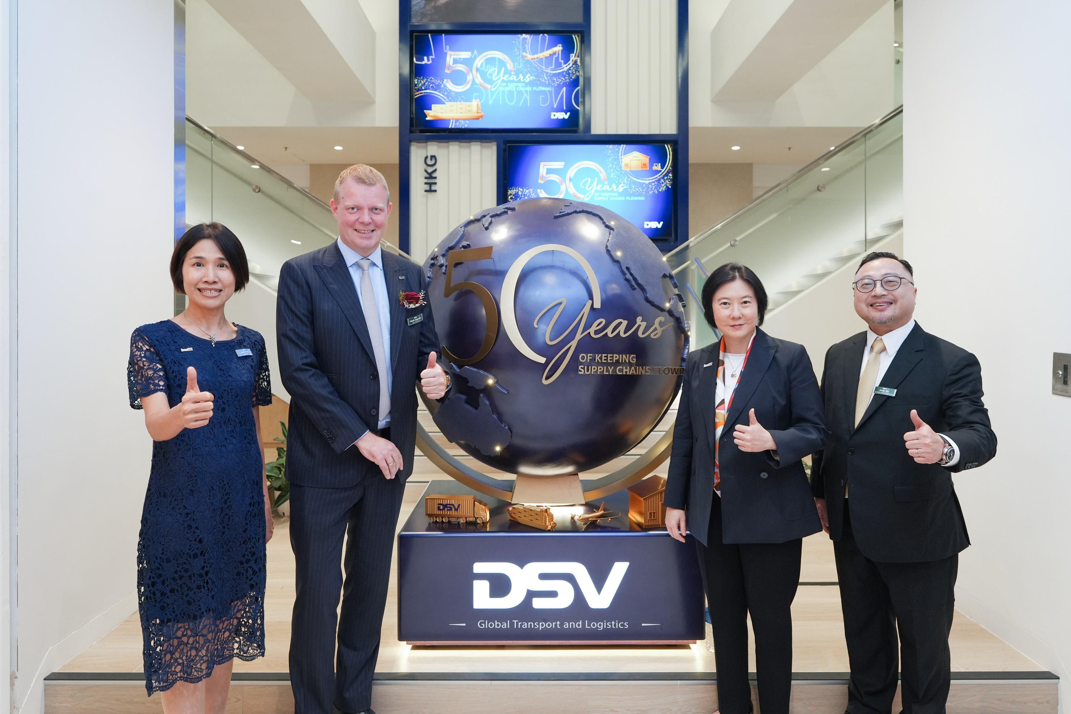 Invest Hong Kong (InvestHK) today (July 10) announced that global transport and logistics leader DSV has completed the expansion of its Greater China and Asia-Pacific regional headquarters in Hong Kong. Photo shows the Director-General of Investment Promotion, Ms Alpha Lau (second right); the Chief Executive Officer of Air & Sea in Asia Pacific at DSV, Mr Jakob Jeppesen (second left); the Vice President of Air & Sea in Hong Kong, Macao, South China at DSV, Mr Andy Siu (first right); and the Senior Vice President of Transport, Logistics and Industrials of InvestHK, Miss Jannet Lam (first left), at DSV's 50th anniversary ceremony held today.
