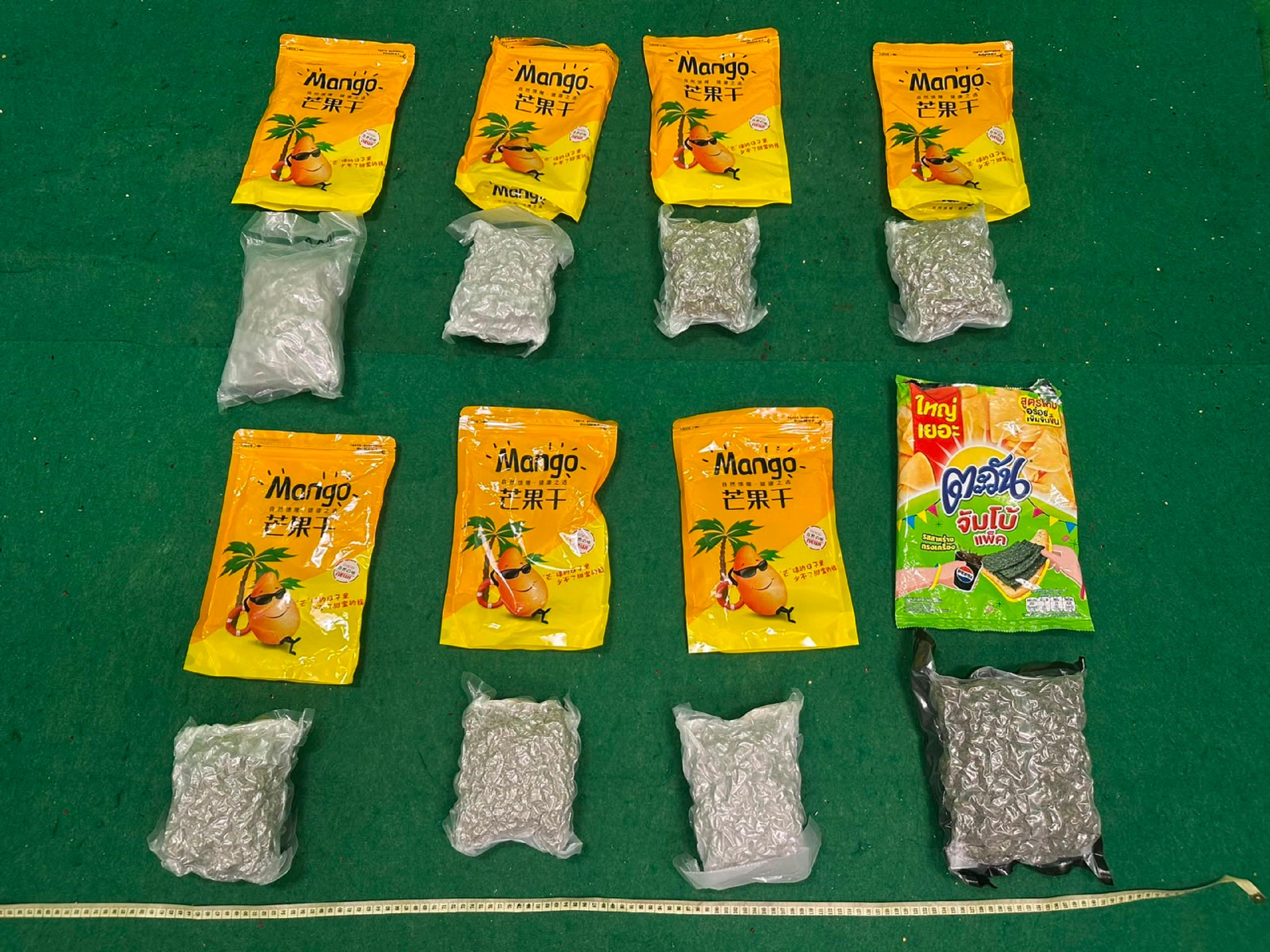Hong Kong Customs yesterday (July 13) detected a drug trafficking case involving an incoming air passenger at Hong Kong International Airport and seized about 7 kilograms of suspected cannabis buds with an estimated market value of about $1.3 million. Photo shows the suspected cannabis buds seized.