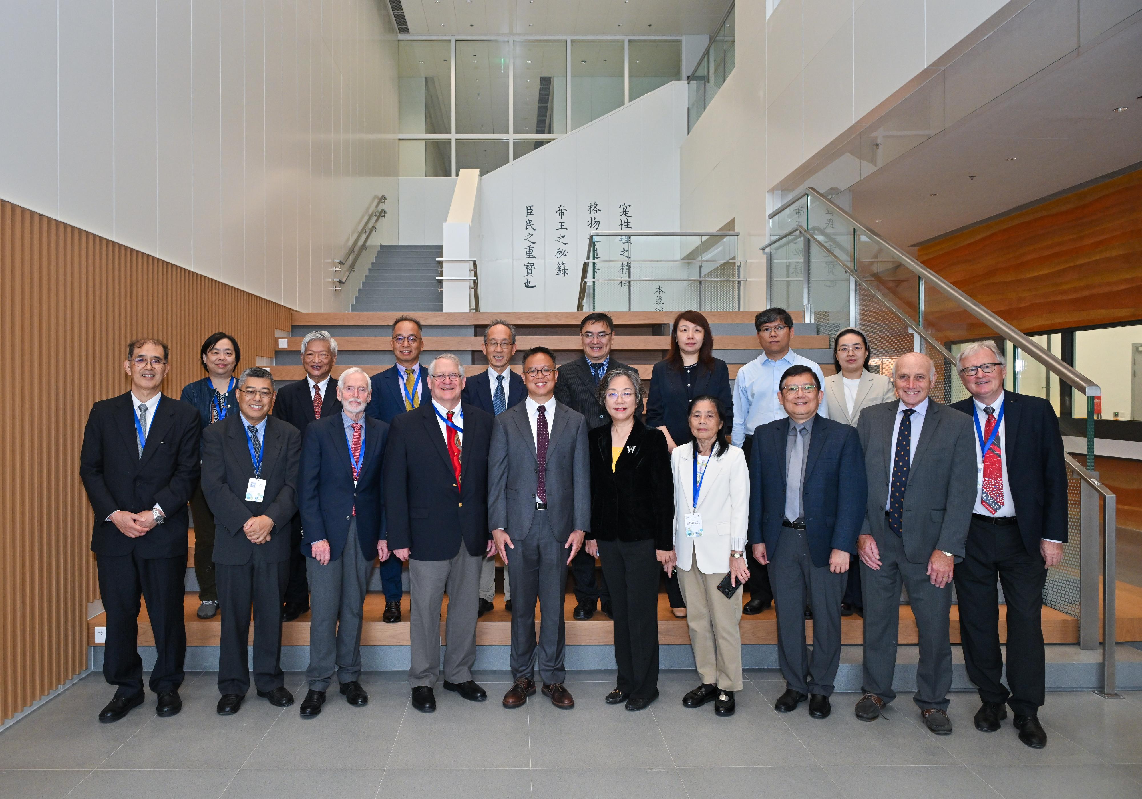 Members of the International Advisory Board (IAB) on Hong Kong Chinese Materia Medica Standards (HKCMMS) today (July 15) visited the permanent premises of the Government Chinese Medicines Testing Institute (GCMTI) of the Department of Health, which opened late last year, to learn more about the GCMTI's work in establishing quality standards, researching and and developing innovative testing methods for Chinese medicines (CM), supporting the industry in CM identification, and promoting CM culture. Photo shows the Assistant Director of Health (Chinese Medicine), Dr Darwin Mak (front row, fifth left), with IAB members and other attendees of the 14th Meeting of the IAB on HKCMMS.